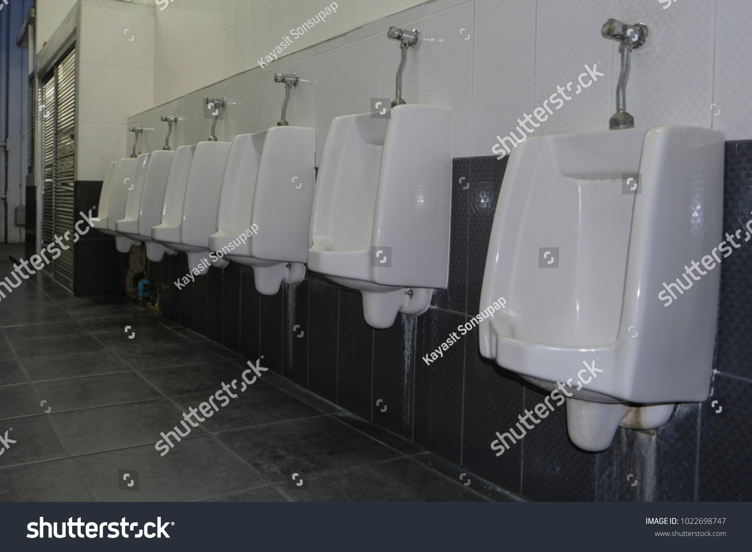 closeup white urinals mens bathroom design stock photo edit now