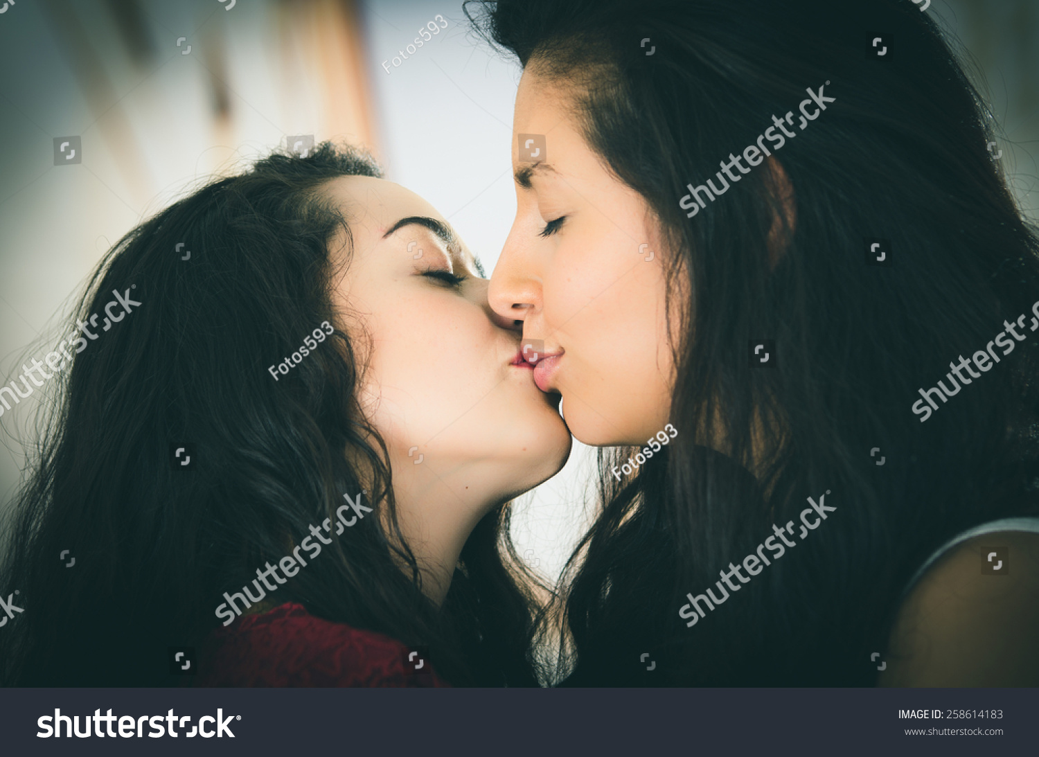 Closeup Portrait Of Cute Lesbian Couple In Love Kissing Outdoors Street View Closeup Portrait Of Cute Lesbian Couple In Love Kissing Outdoors Street View