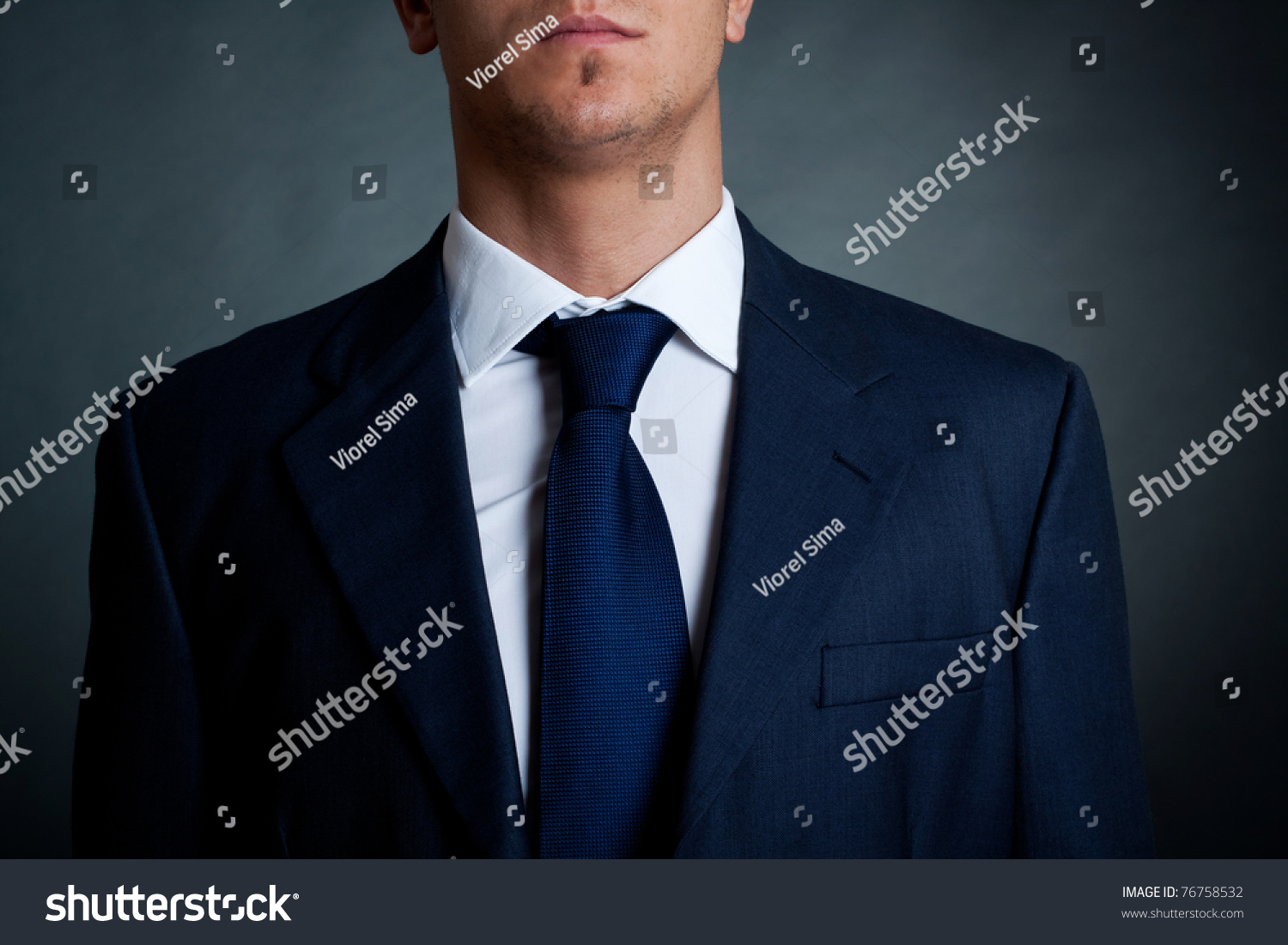 Closeup Shot Of Business Suit On A Man, Over Dark Background Stock ...