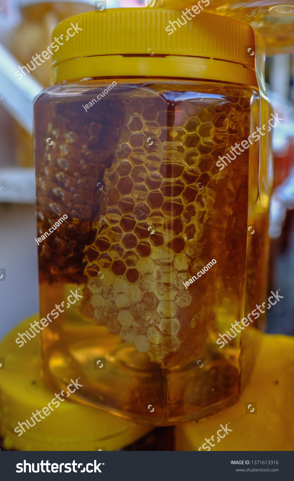 Download Closeup View Golden Honey Honeycomb Plastic Stock Photo Edit Now 1371613316 Yellowimages Mockups