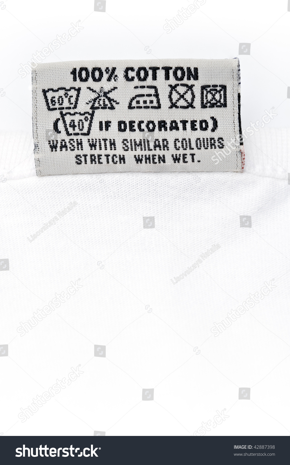 Clothing Label Washing Instruction Tag On White T-Shirt Stock Photo ...