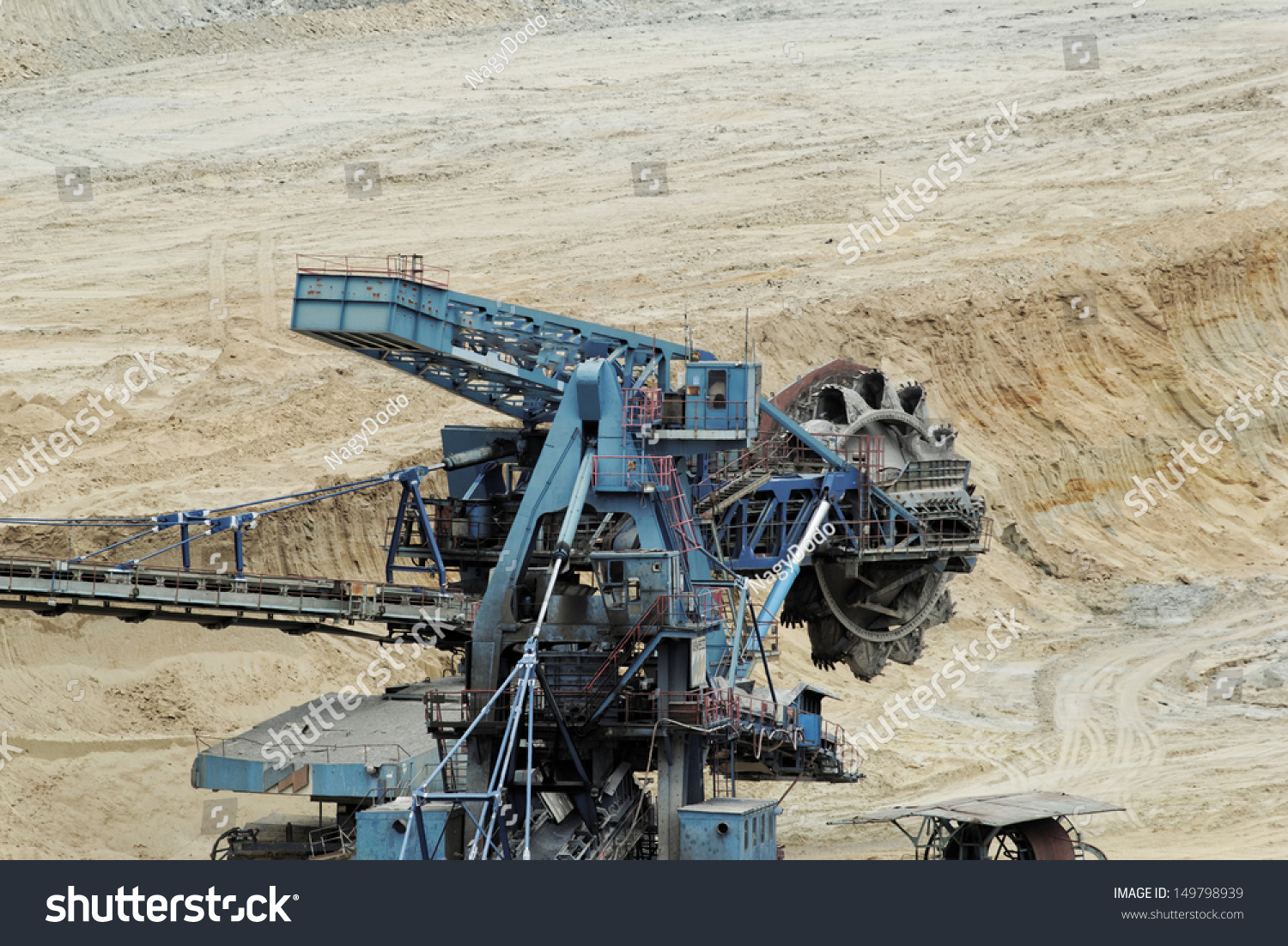 Coal Mining In An Open Pit With Huge Industrial Machine Stock Photo ...