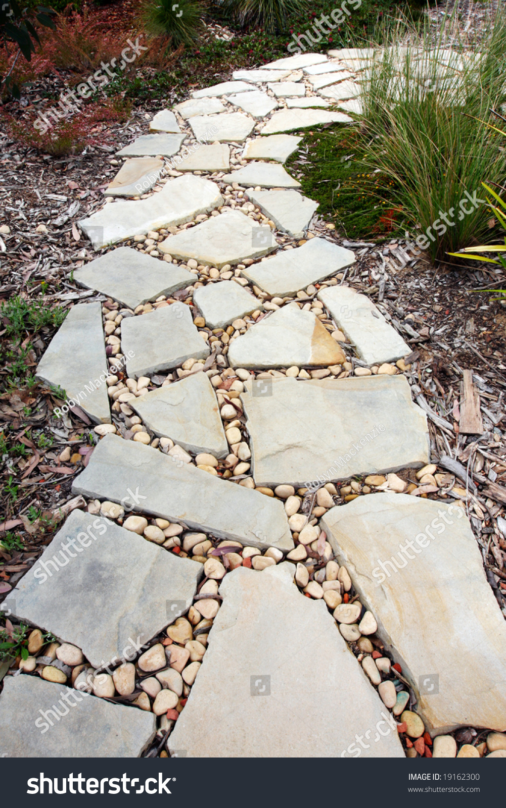 Cobblestone And Pebble Pathway Winding Through A Garden. Stock Photo ...