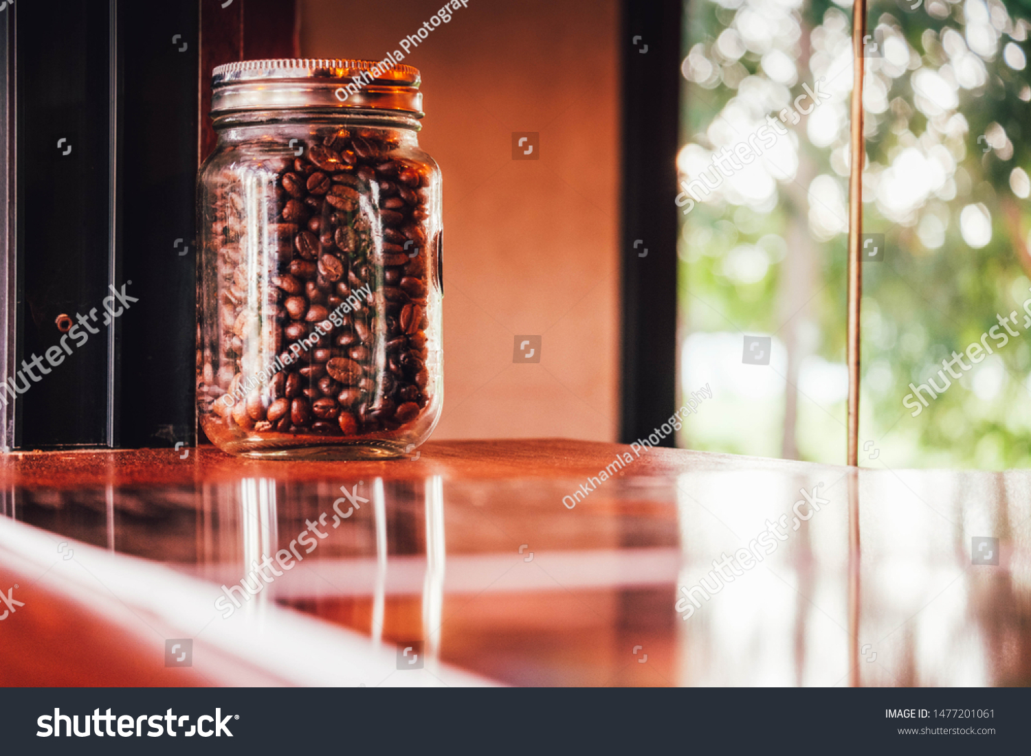 Download Coffee Beans Packed Glass Jar Placed Stock Photo Edit Now 1477201061 Yellowimages Mockups