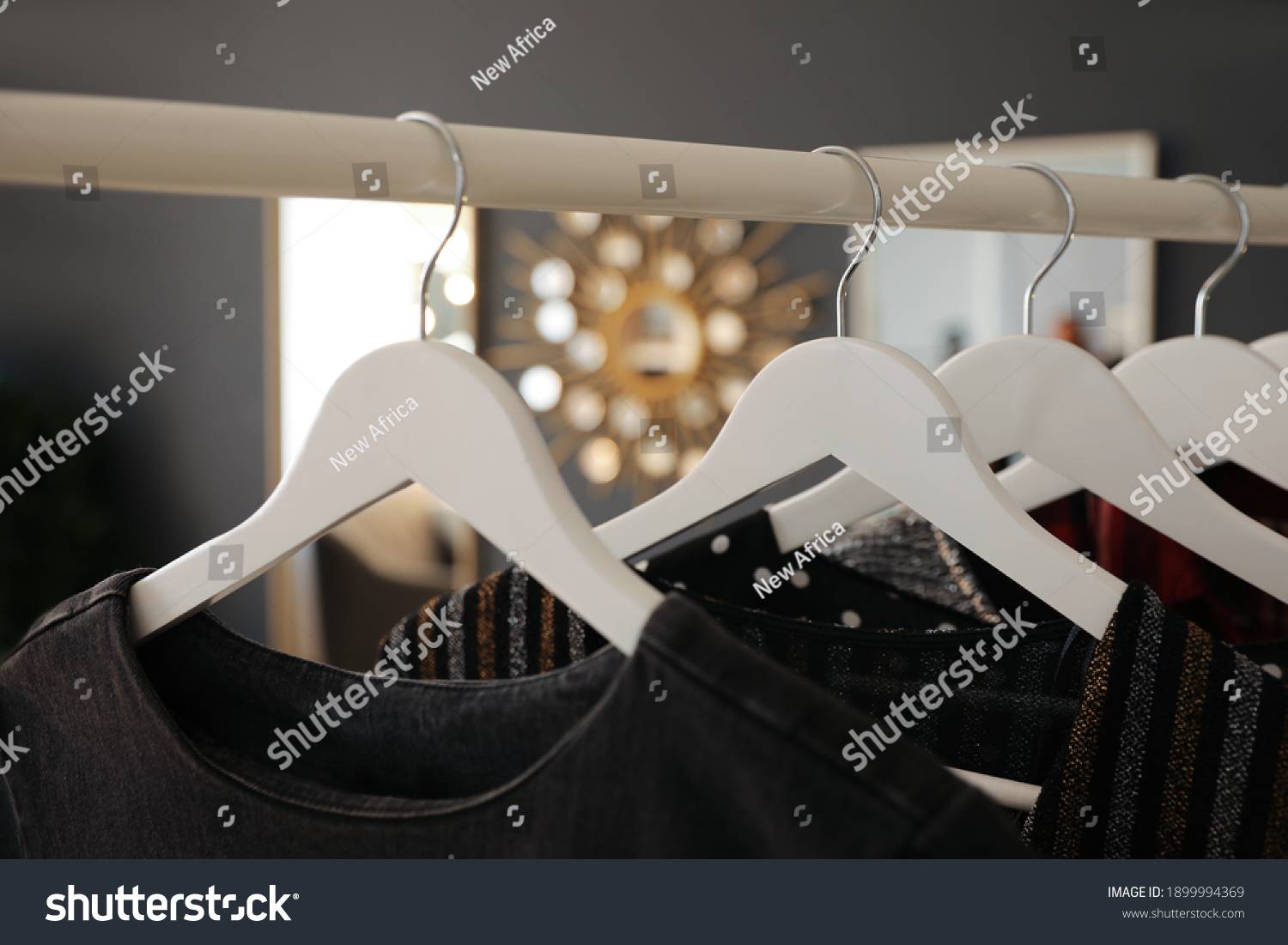 Collection Modern Clothes Hanging On Rack Stock Photo 1899994369 ...