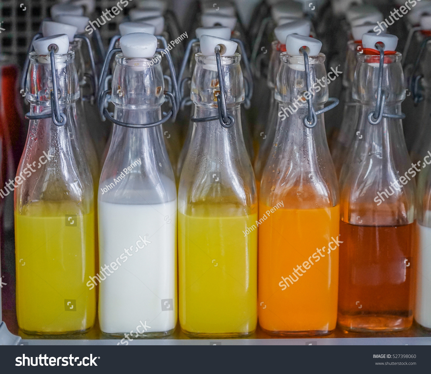 Download Colorful Bottles Fruit Juice Stock Photo Edit Now 527398060 Yellowimages Mockups
