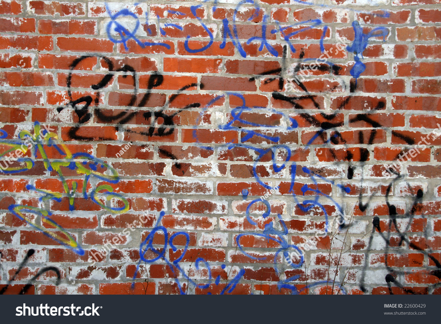 Colorful Graffiti On Red Brick Wall Stock Photo 22600429 - Shutterstock