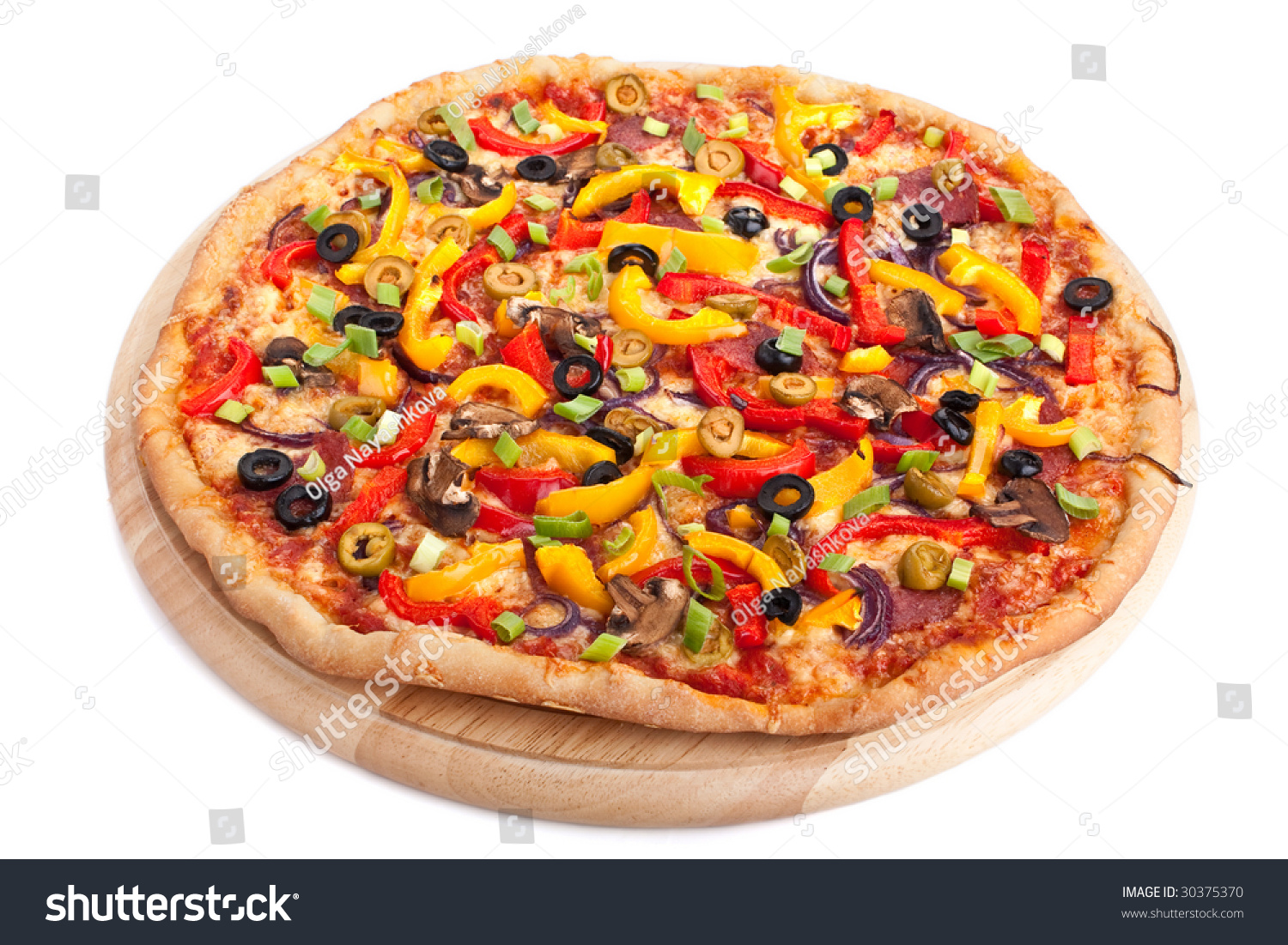 Colorful Vegetable Pizza On A Round Wooden Chopping Board Stock Photo ...