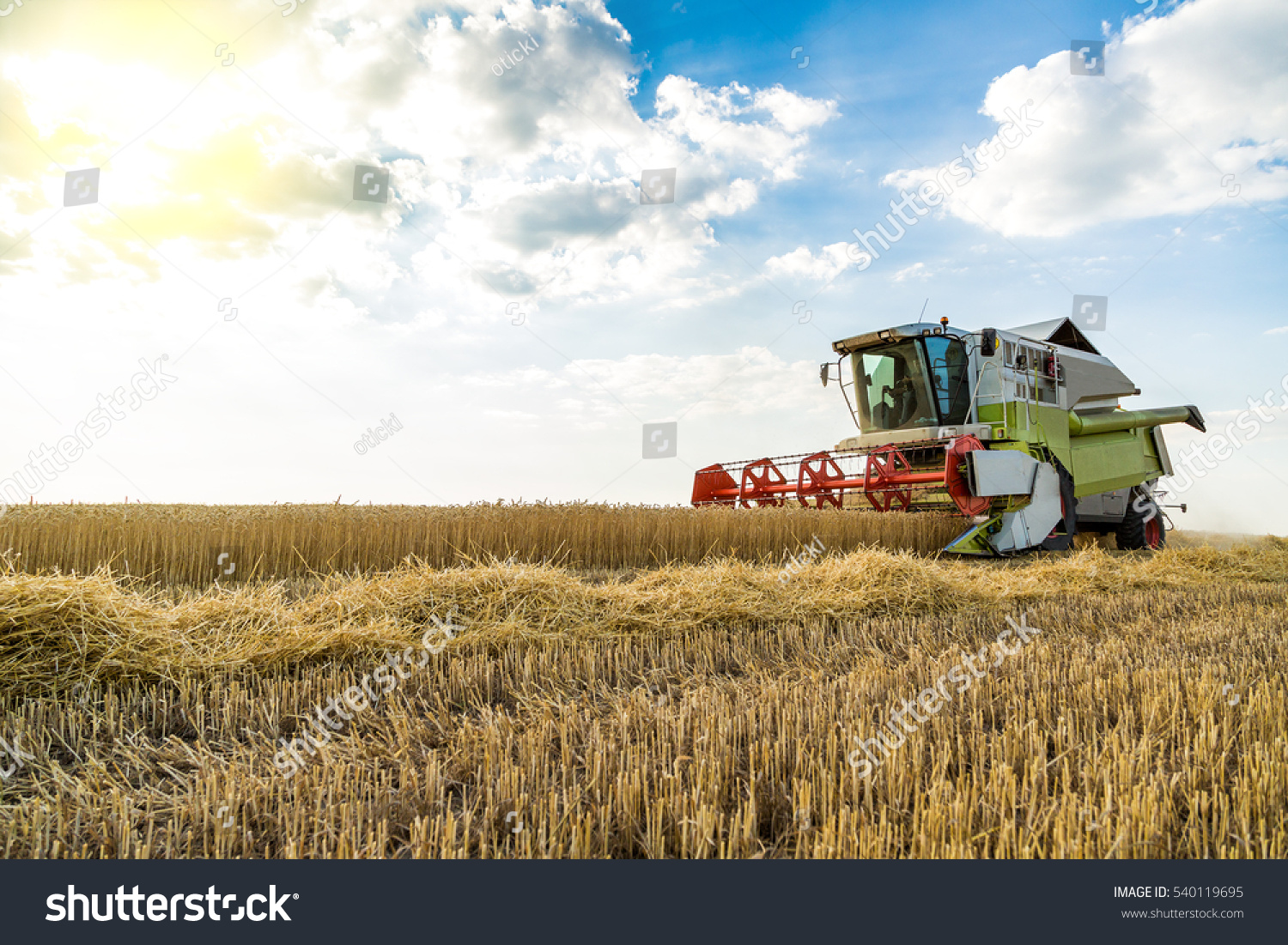 Combine Harvester Action On Wheat Field Stock Photo 540119695