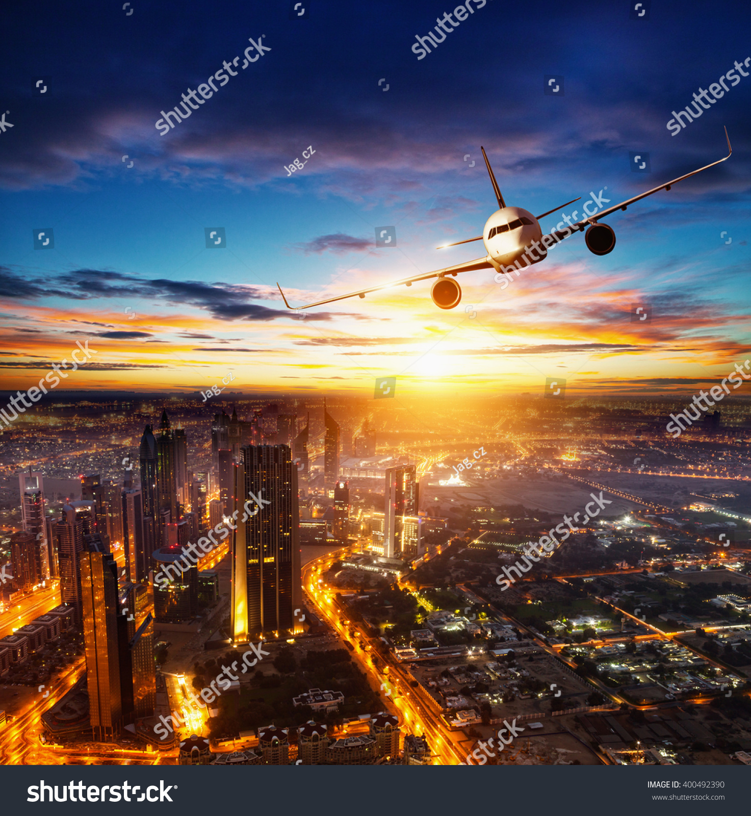 Commercial Airplane Flying Over Modern City Stock Photo 400492390 ...