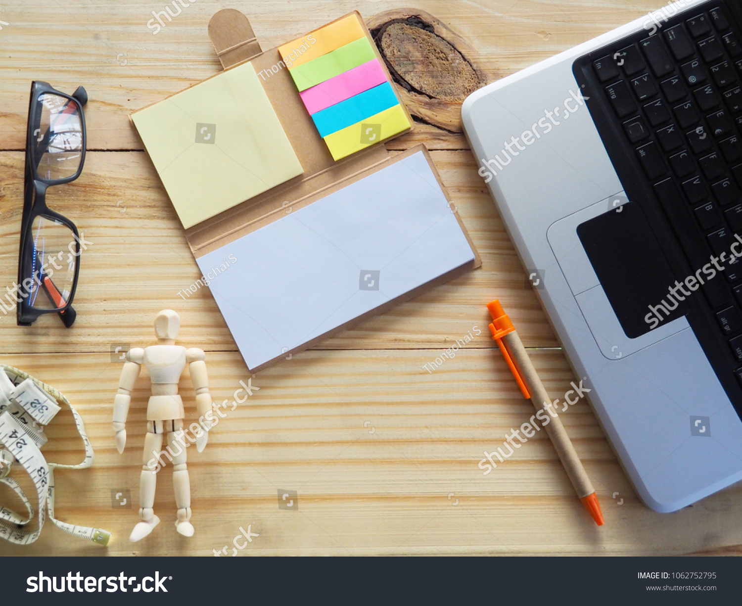 Computer Notebook Measuring Tape On Table Stock Photo Edit Now