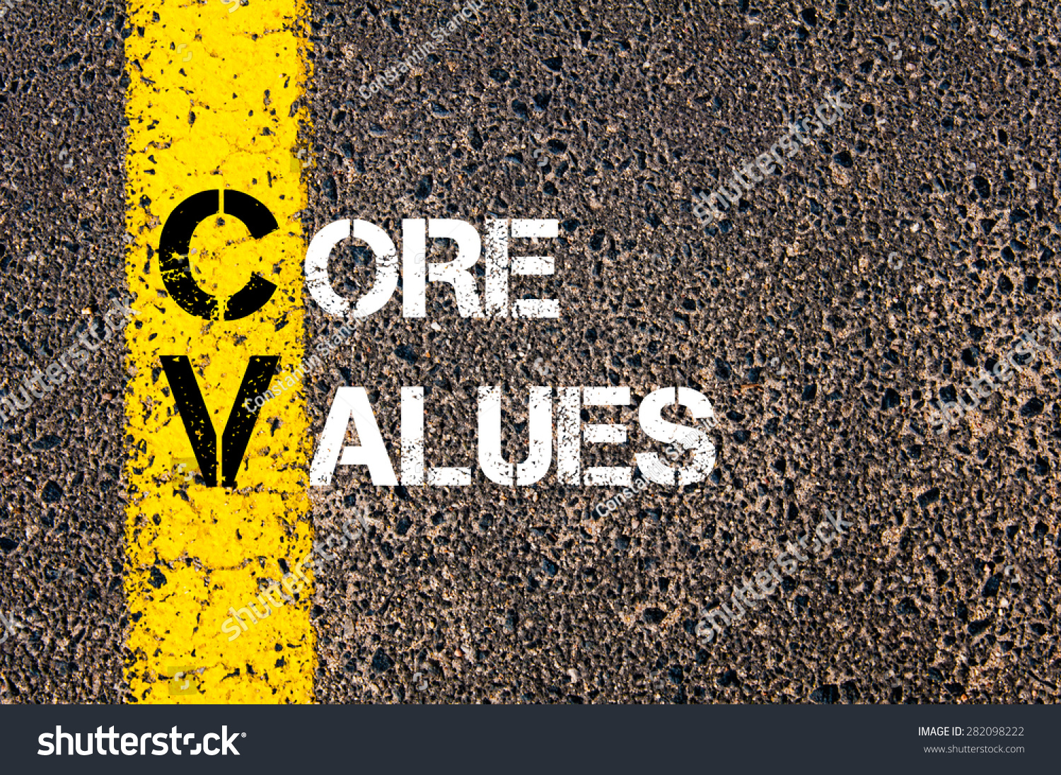 concept image of business acronym cv as core values written over road marking yellow paint line