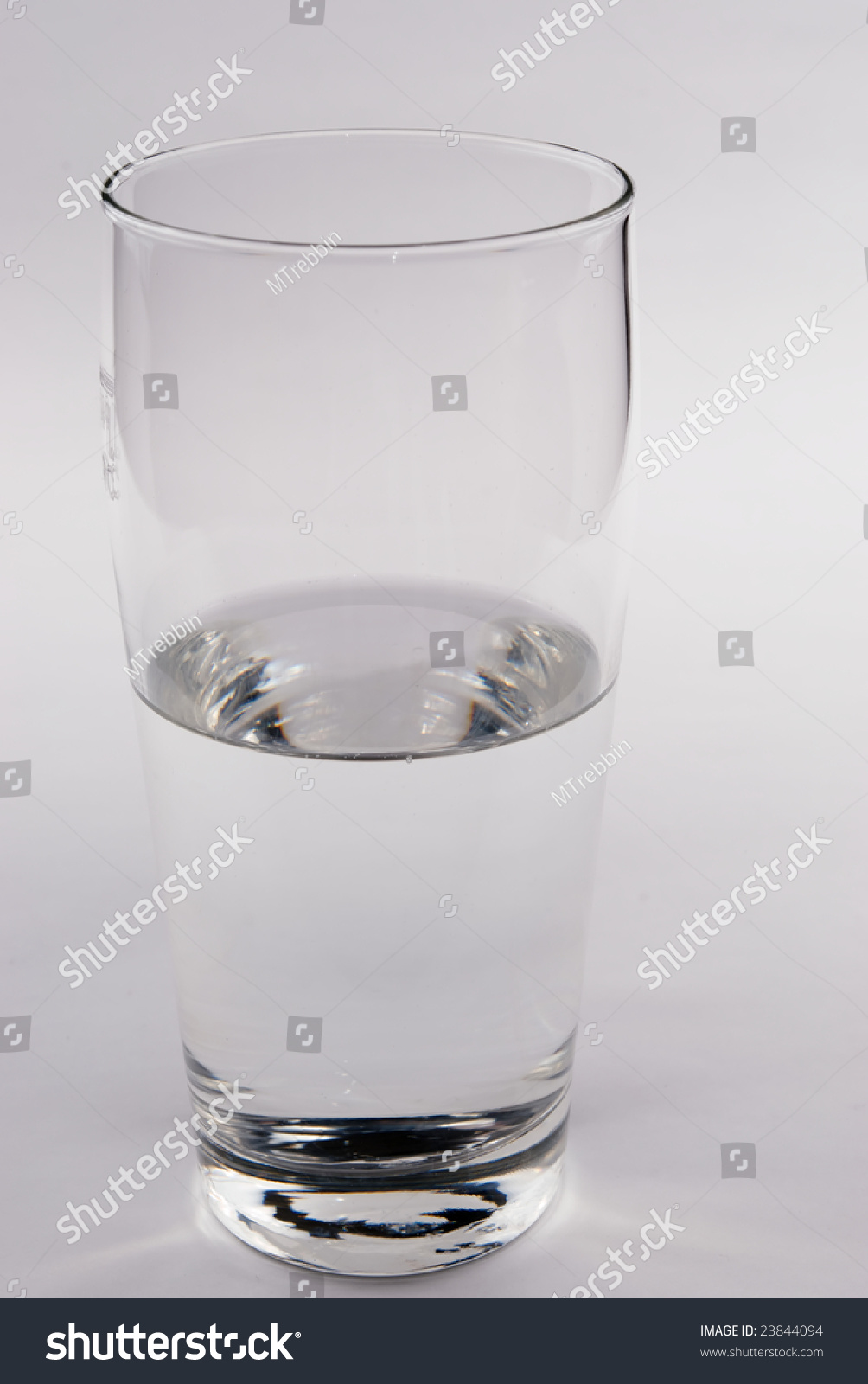 Conceptual And Simple Shot Of Half Full Or Half Empty Glass With Water ...