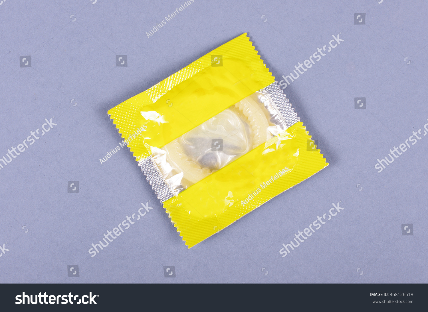 Download Condom Semi Transparent Yellow Wrapper Isolated Objects Stock Image 468126518 PSD Mockup Templates