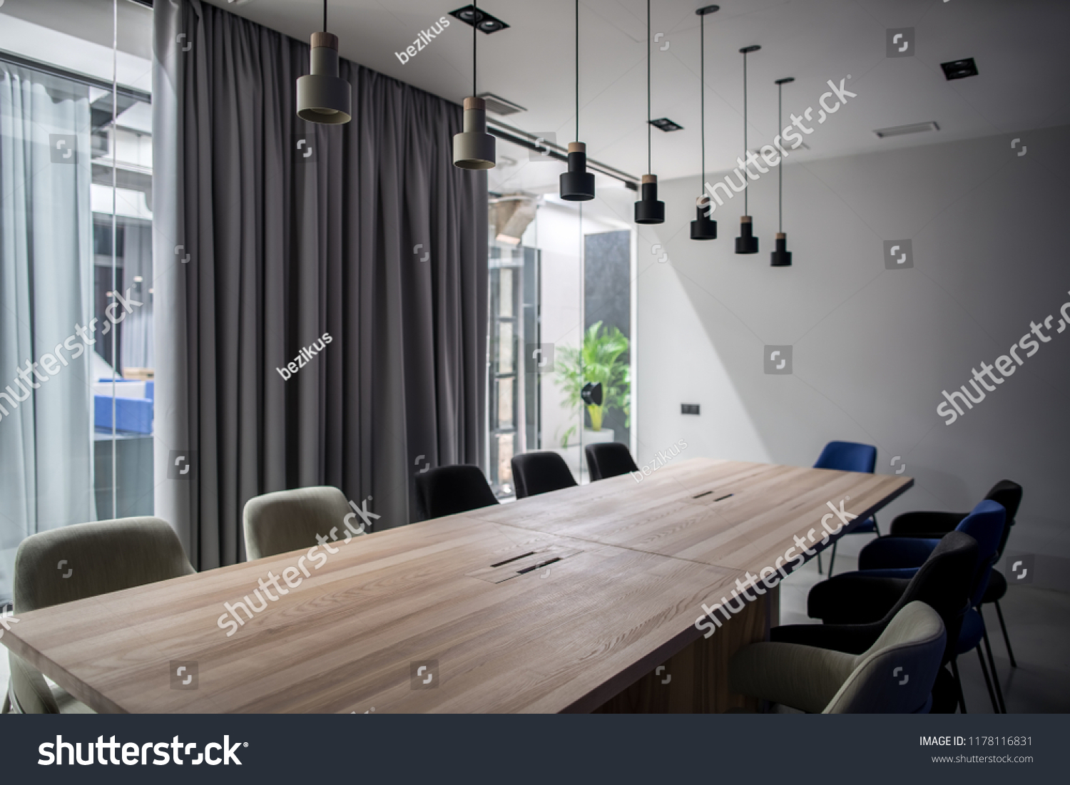 2 832 Meeting Room Curtain Images Stock Photos Vectors Shutterstock   Stock Photo Conference Room In A Luminous Office With Gray Walls There Are Wide Wooden Tables With Multicolor 1178116831 