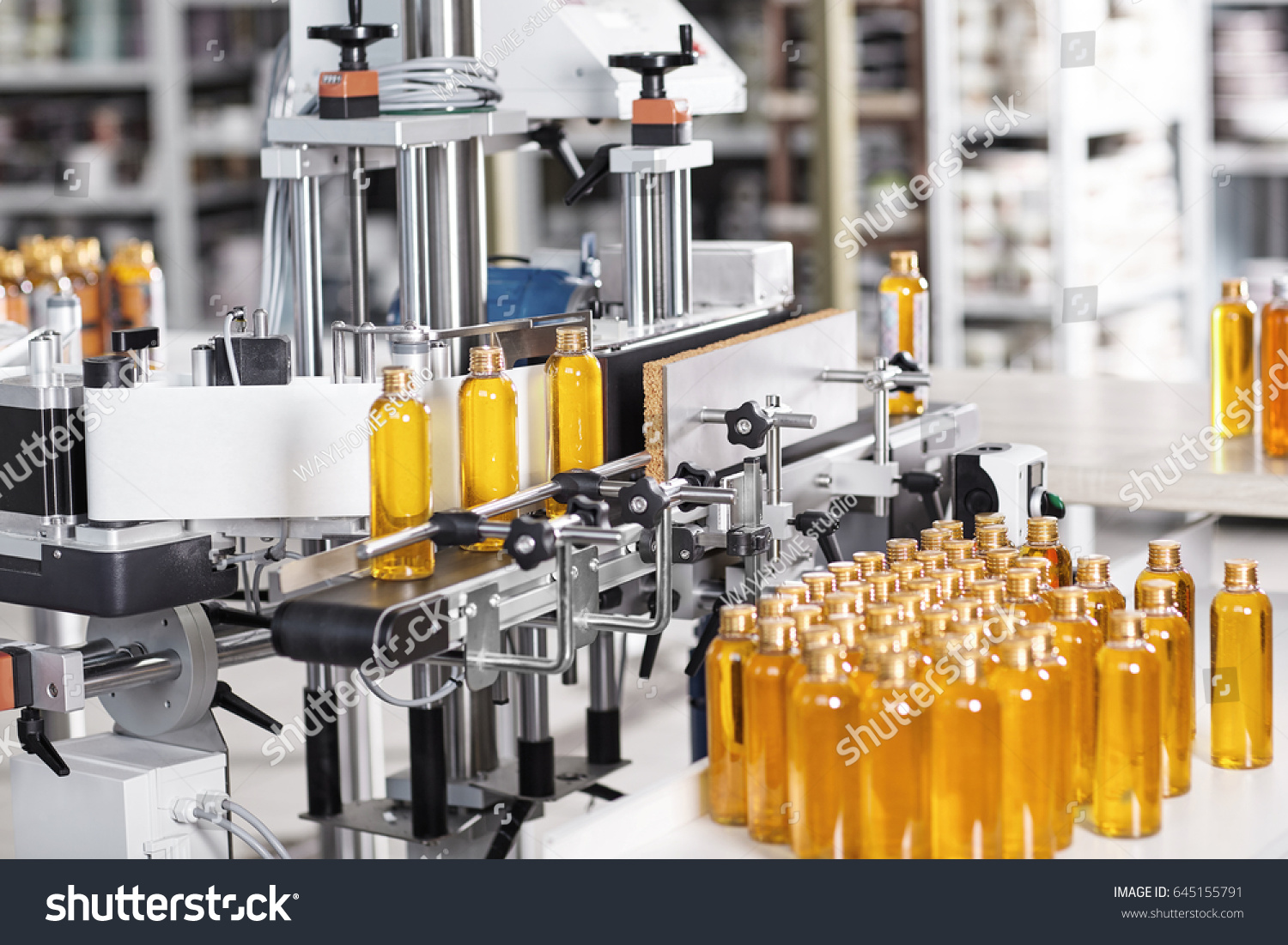 Download Cosmetics Factory Bottling Line Filled Yellow Stock Photo Edit Now 645155791 PSD Mockup Templates