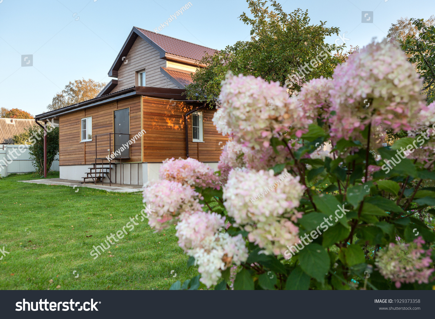 1 363 977 House With Flowers Images Stock Photos Vectors Shutterstock   Stock Photo Country House With Backyard Beautiful Flowers Are On Foreground And Green Lawn Is In Front Of 1929373358 