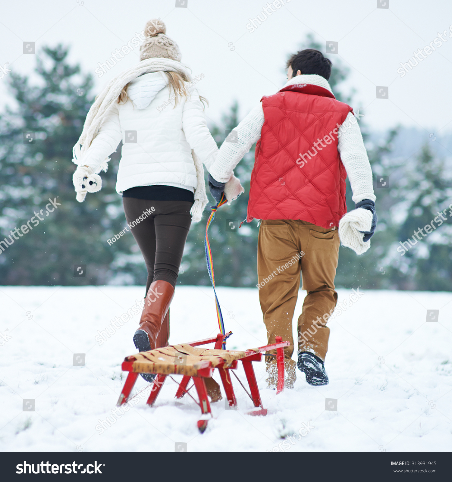 Couple Winter Pulling Sled Together Through Stock Photo Edit Now