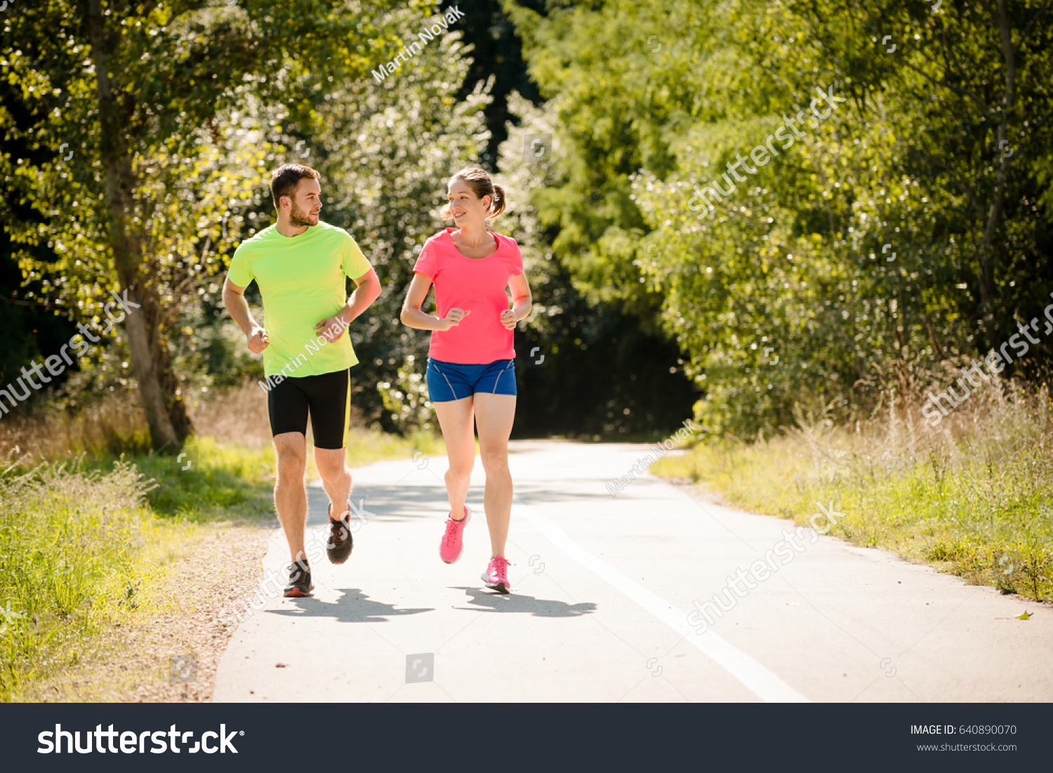 Couple Jogging Together Talking Summer Sunny Stock Photo Edit Now