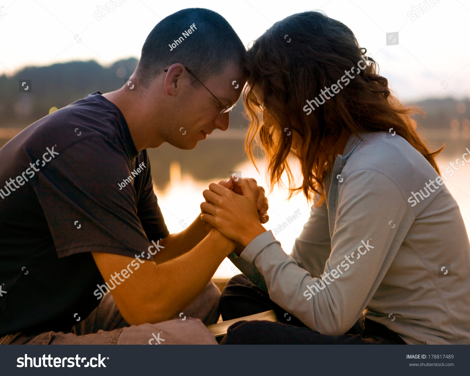 Couple Praying Together Stock Photo (Edit Now) 178817489