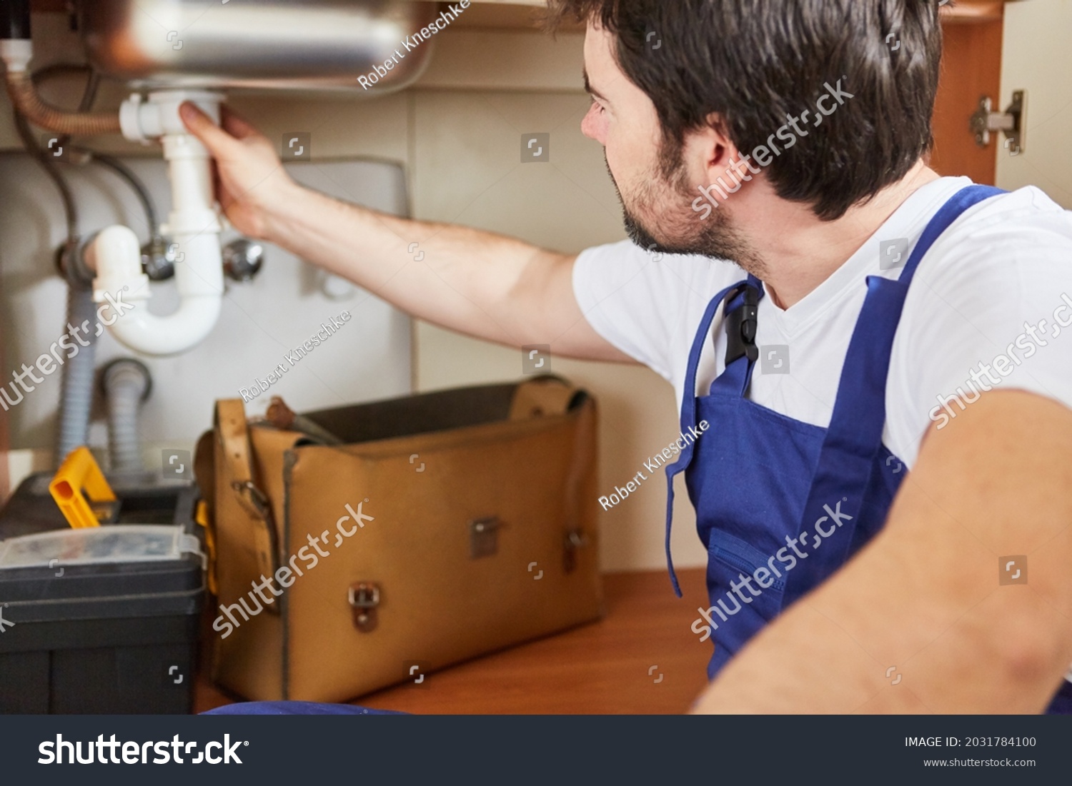 13 126 Broken Drains Images Stock Photos Vectors Shutterstock   Stock Photo Craftsman As A Plumber In The Repair Of A Broken Drain Pipe Of A Sink 2031784100 