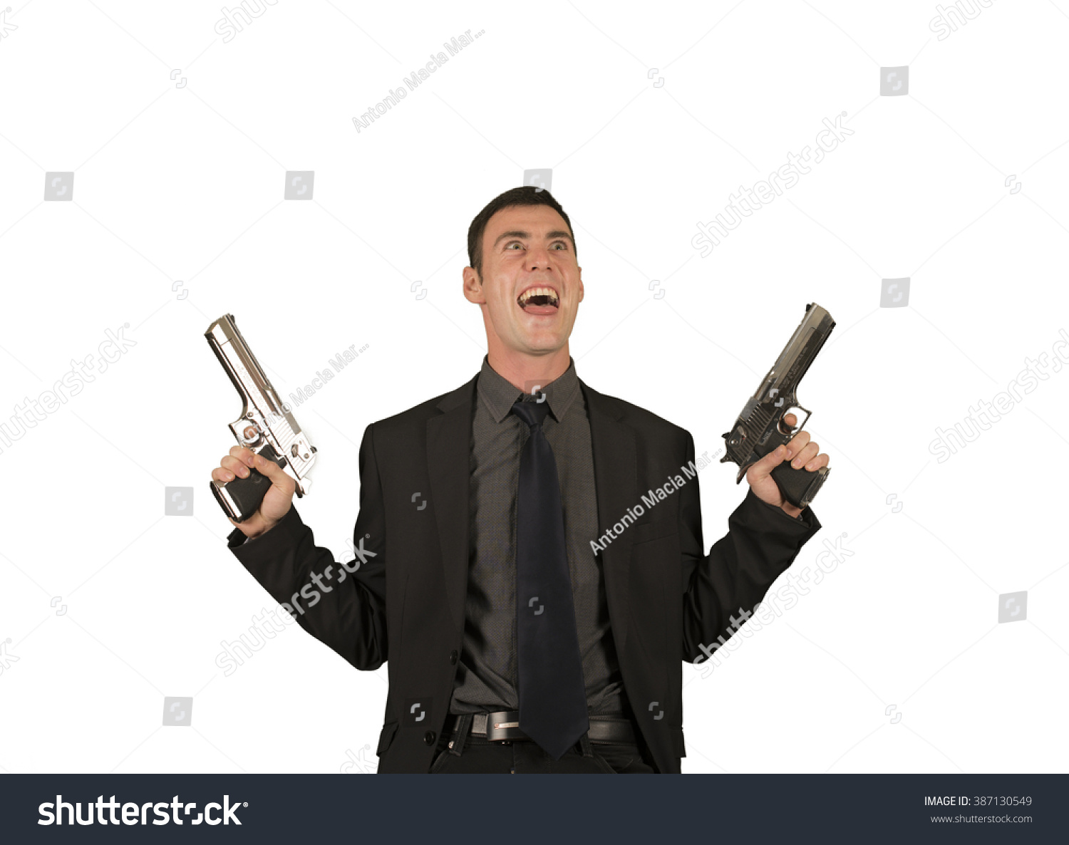 Crazy Businessman In Suit Holding Two Guns Stock Photo 387130549