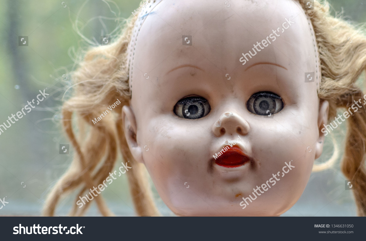 creepy doll looks