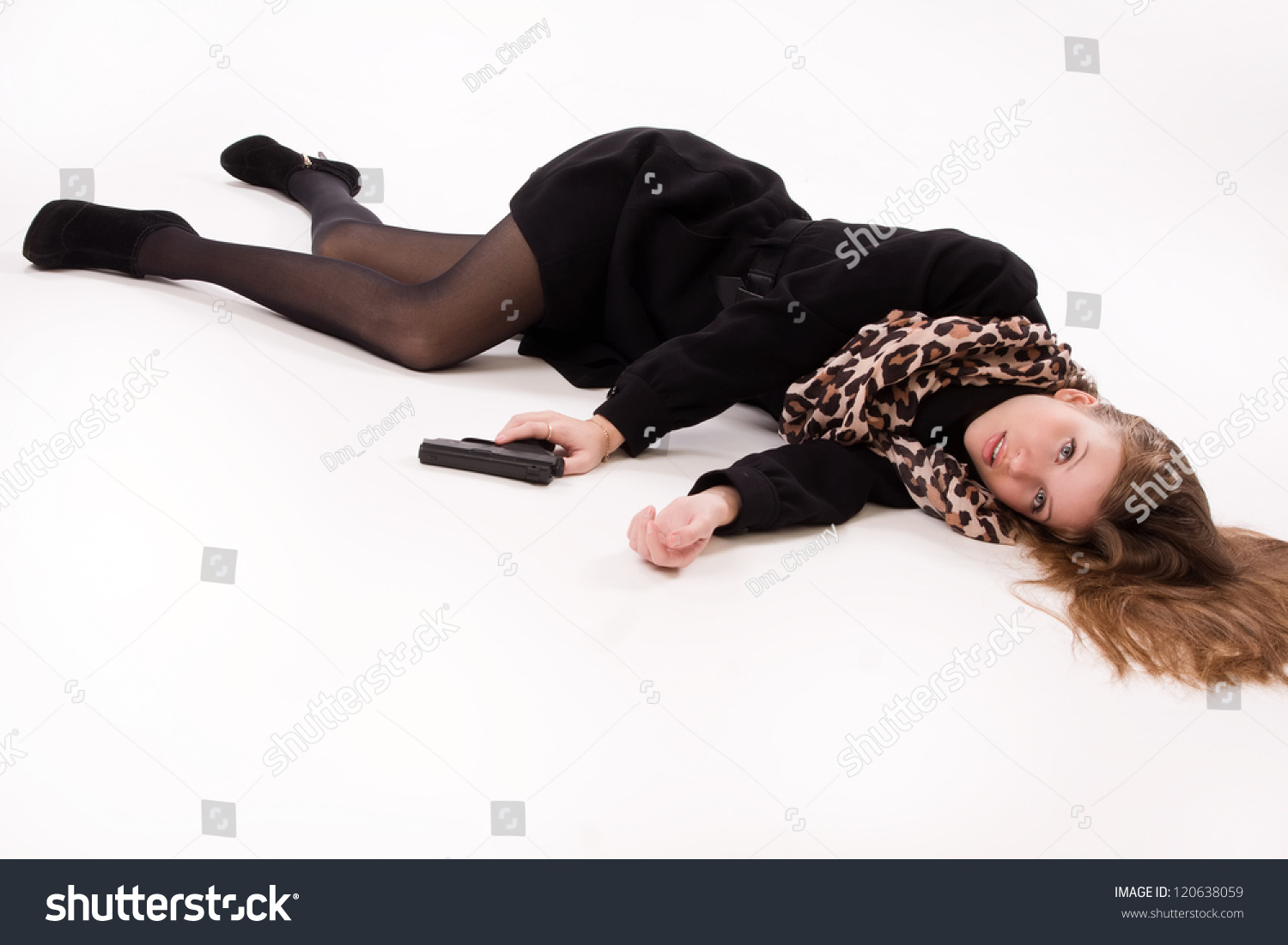 Crime Scene Imitation. Spy Girl With Gun Lying On The Floor Stock Photo ...