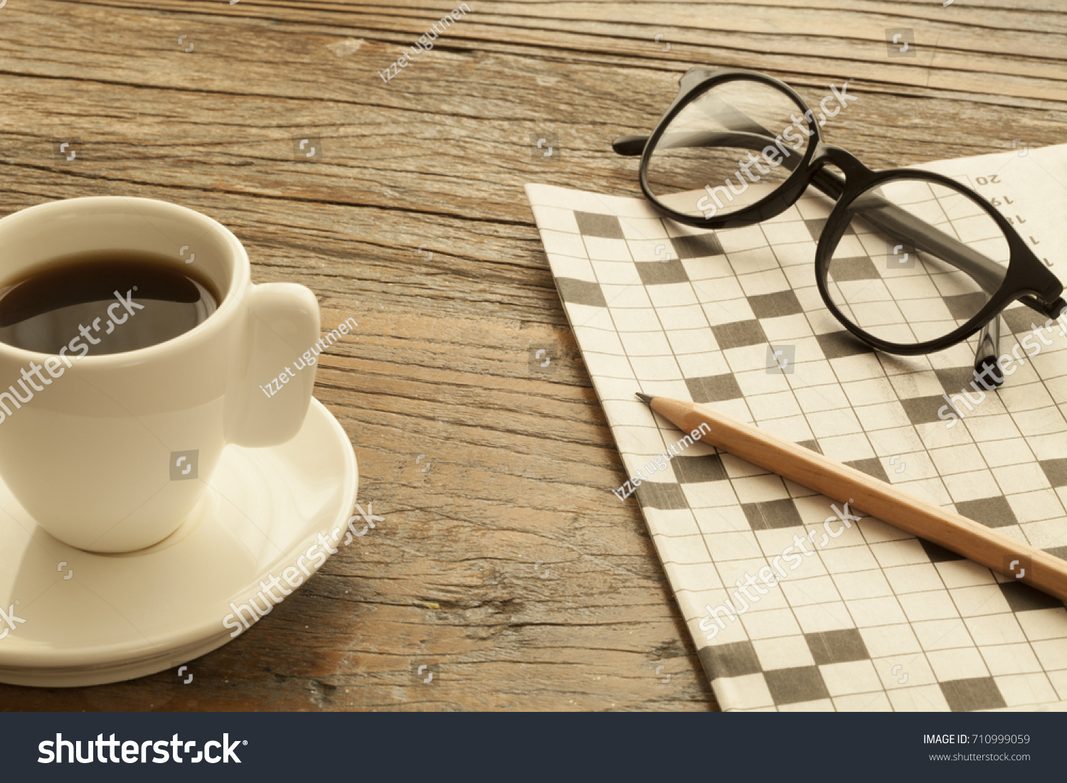 Stock Photo Crossword At Newspaper With Coffee 710999059 