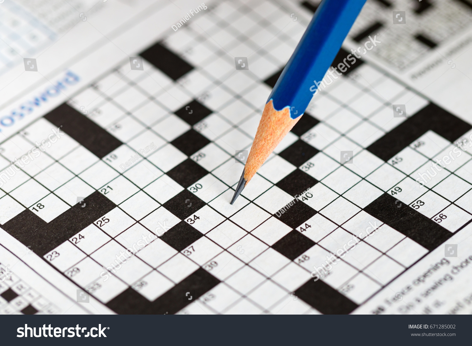 Crossword Puzzle Pencil Stock Photo (Edit Now) 671285002