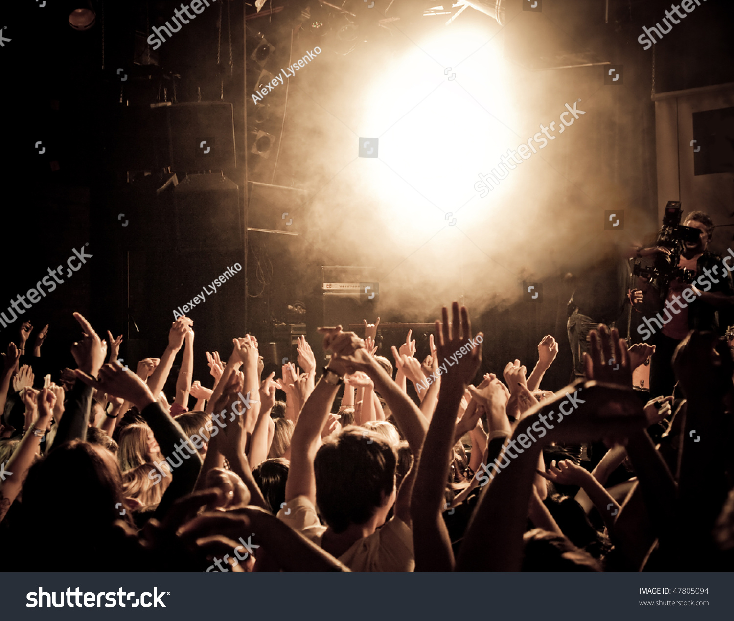 Crowd At A Music Concert, Audience Raising Hands Up Stock Photo ...