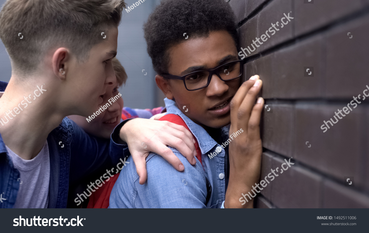 Cruel Teenagers Pushing Black Boy Wall Stock Photo 1492511006 ...