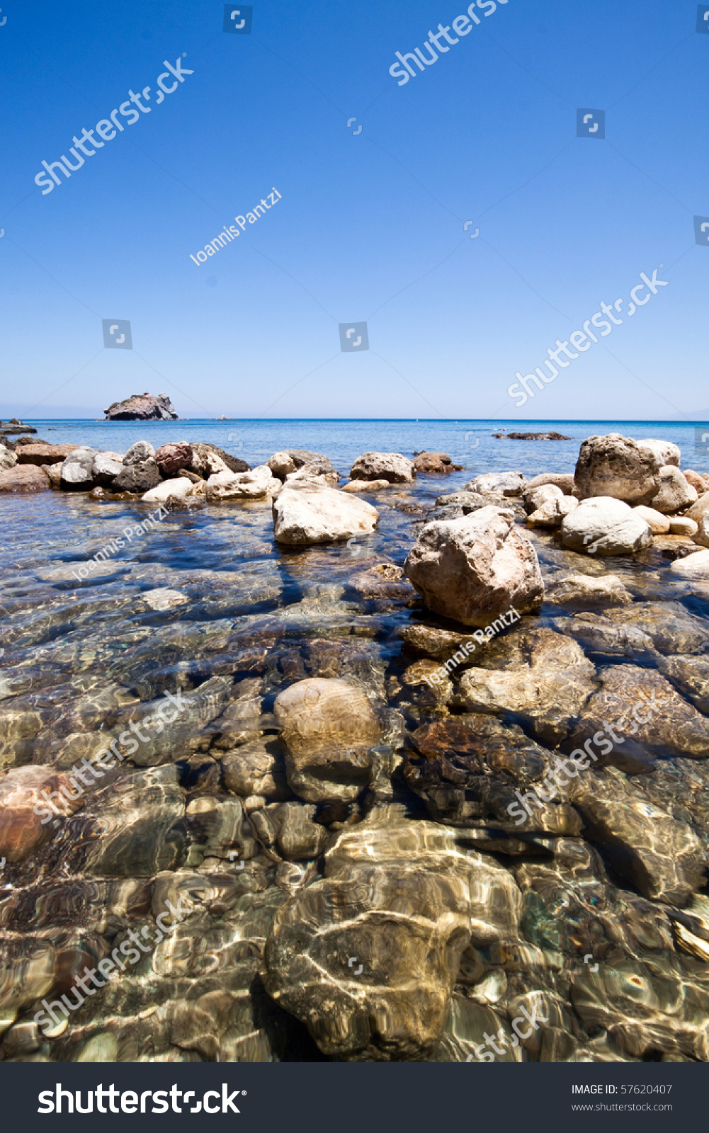 Crystal Clear Water And Rocks Of An Exotic Beach Stock Photo 57620407 ...