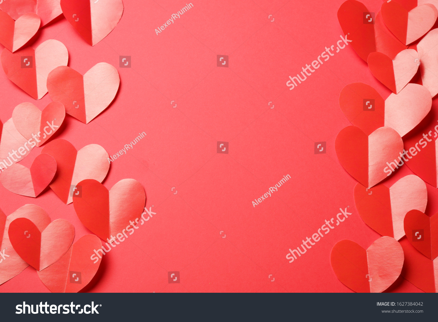 Cut out of red paper hearts on red background. Beautiful Valentines day, Womans day, love, romantic or wedding composition with copy space for your text for banner, congratulation, card, offer, flyer, advertising, invitation.