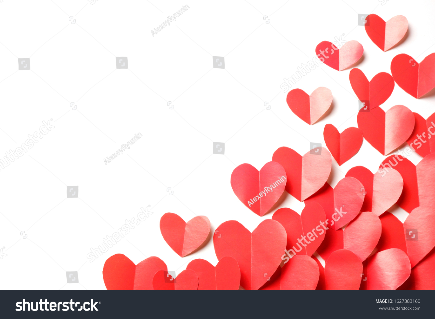 Cut out of red paper hearts on white background isolated. Cute Valentines day, Womans day, love, romantic, wedding composition with copy space for your text for banner, card, offer, flyer, advertising, invitation.