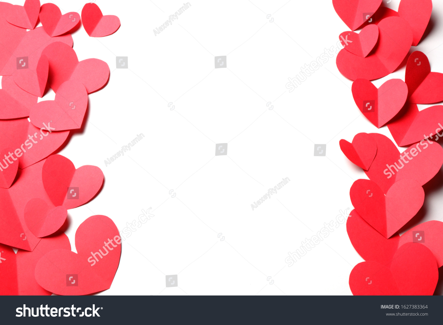 Cut out of red paper hearts on white background isolated. Cute Valentines day, Womans day, love, romantic or wedding composition with free space for custom tex for banner, congratulation, card, offer, flyer, advertising, invitation.