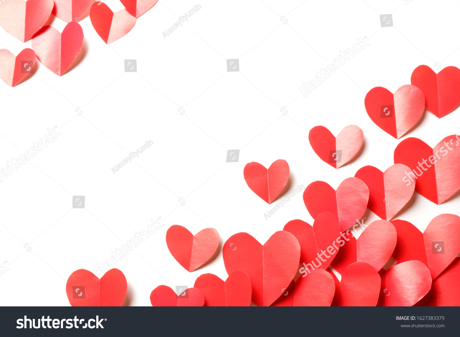 Cut out of red paper hearts on white background isolated. Cute Valentines day, Womans day, love, romantic or wedding composition with copy space for your text  for banner, card, offer, flyer, advertising, invitation.