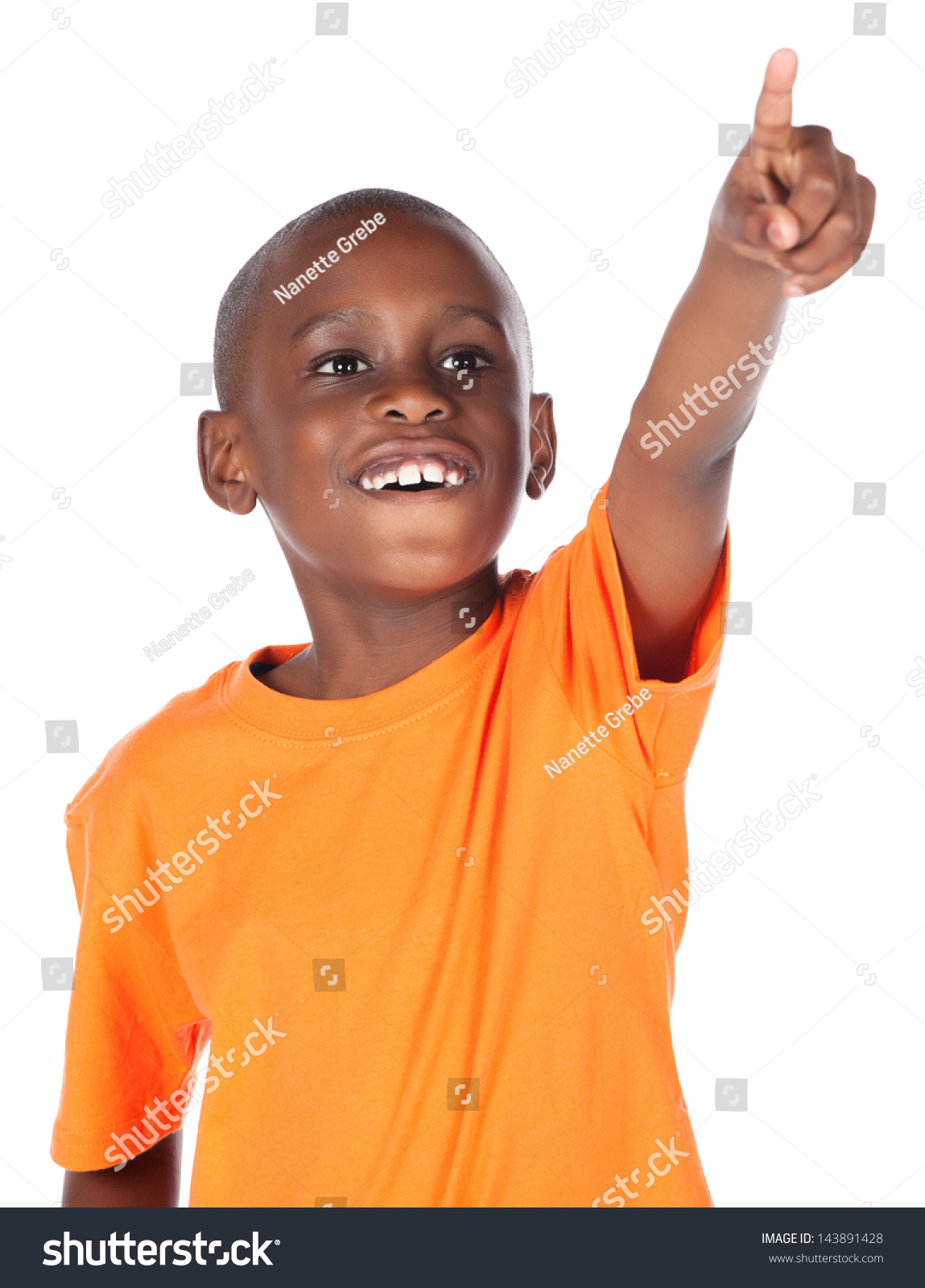 Cute African Boy Wearing A Bright Orange T-Shirt. The Boy Is Pointing ...