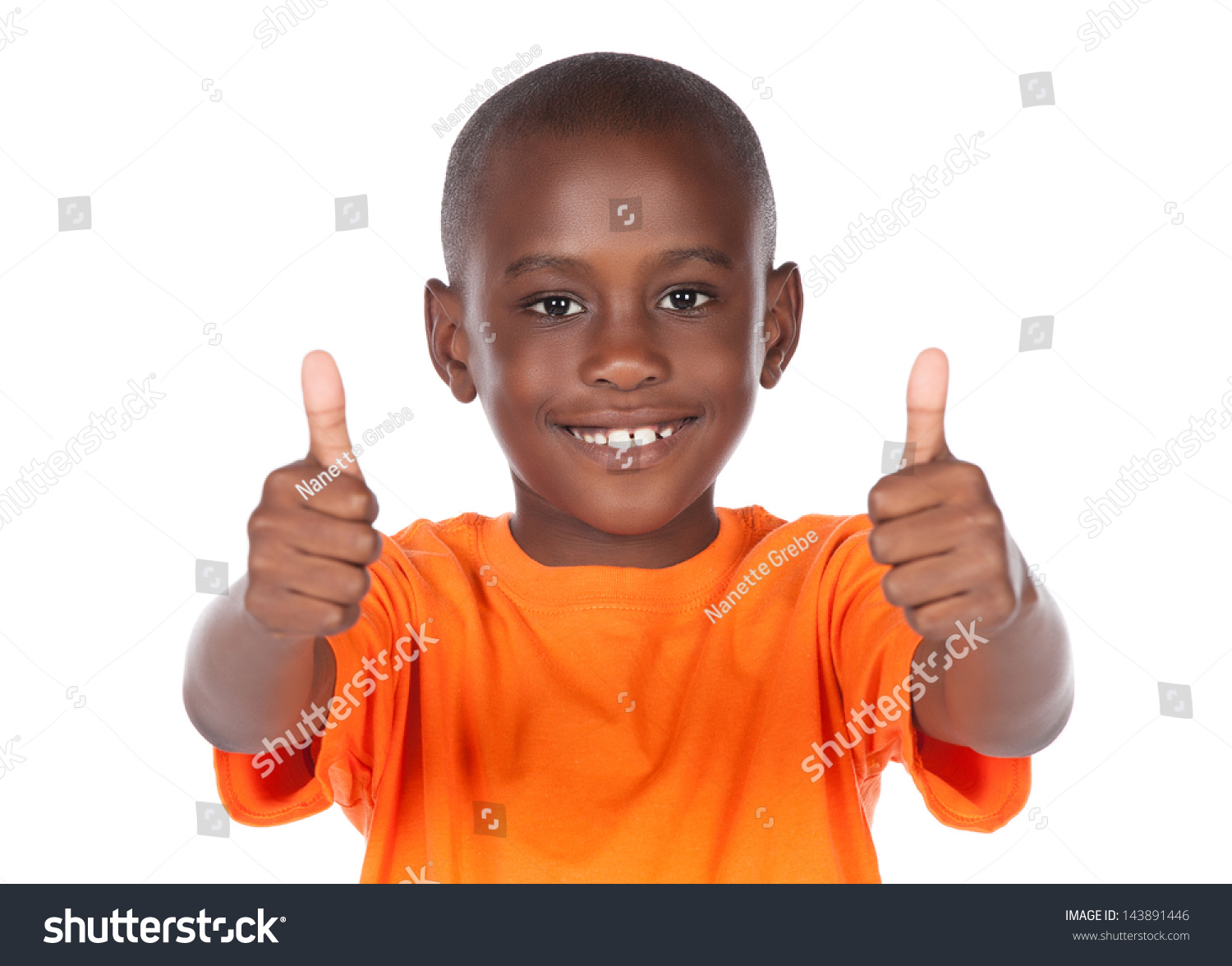 Cute African Boy Wearing A Bright Orange T-Shirt. The Boy Is Showing A ...