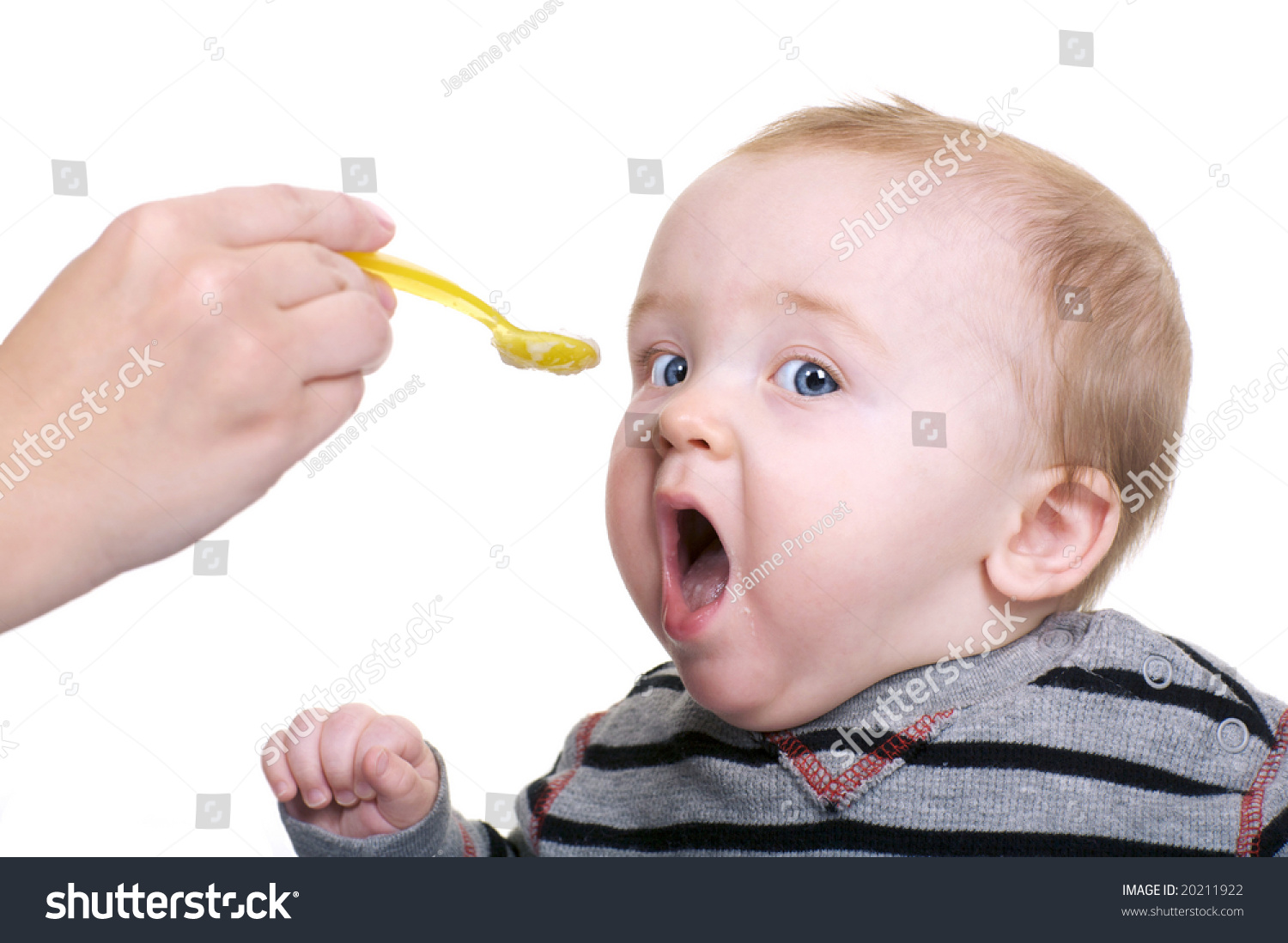 spoon feeding rice cereal