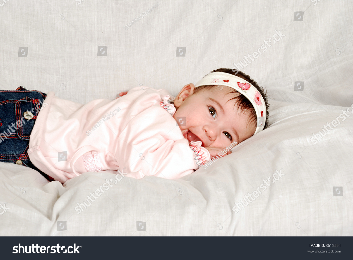 Cute Baby Girl Lying On Tummy Stock Photo Edit Now