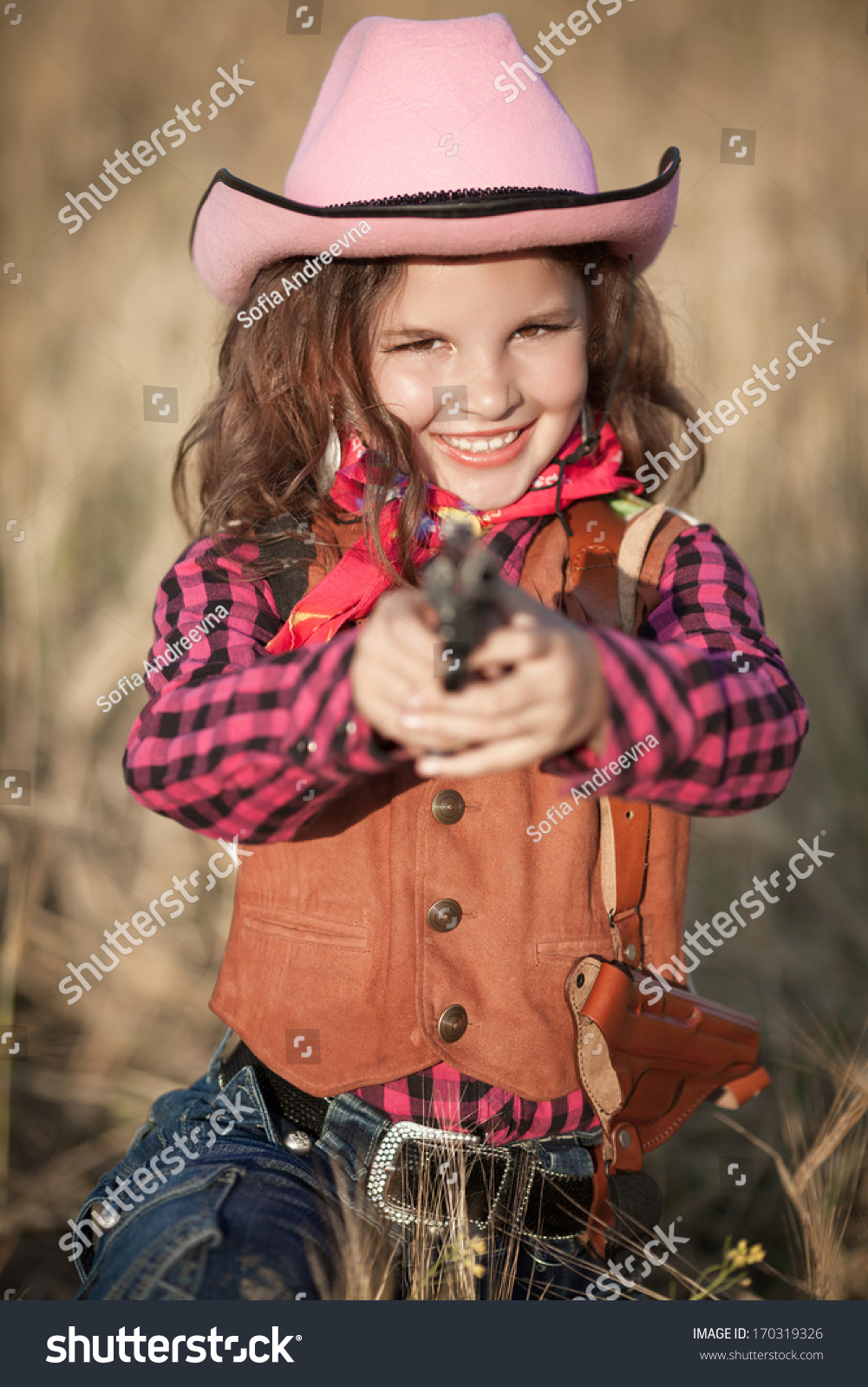 Cute Child Having Fun Outdoors, Little Girl Cowboy Playing In Wheat ...