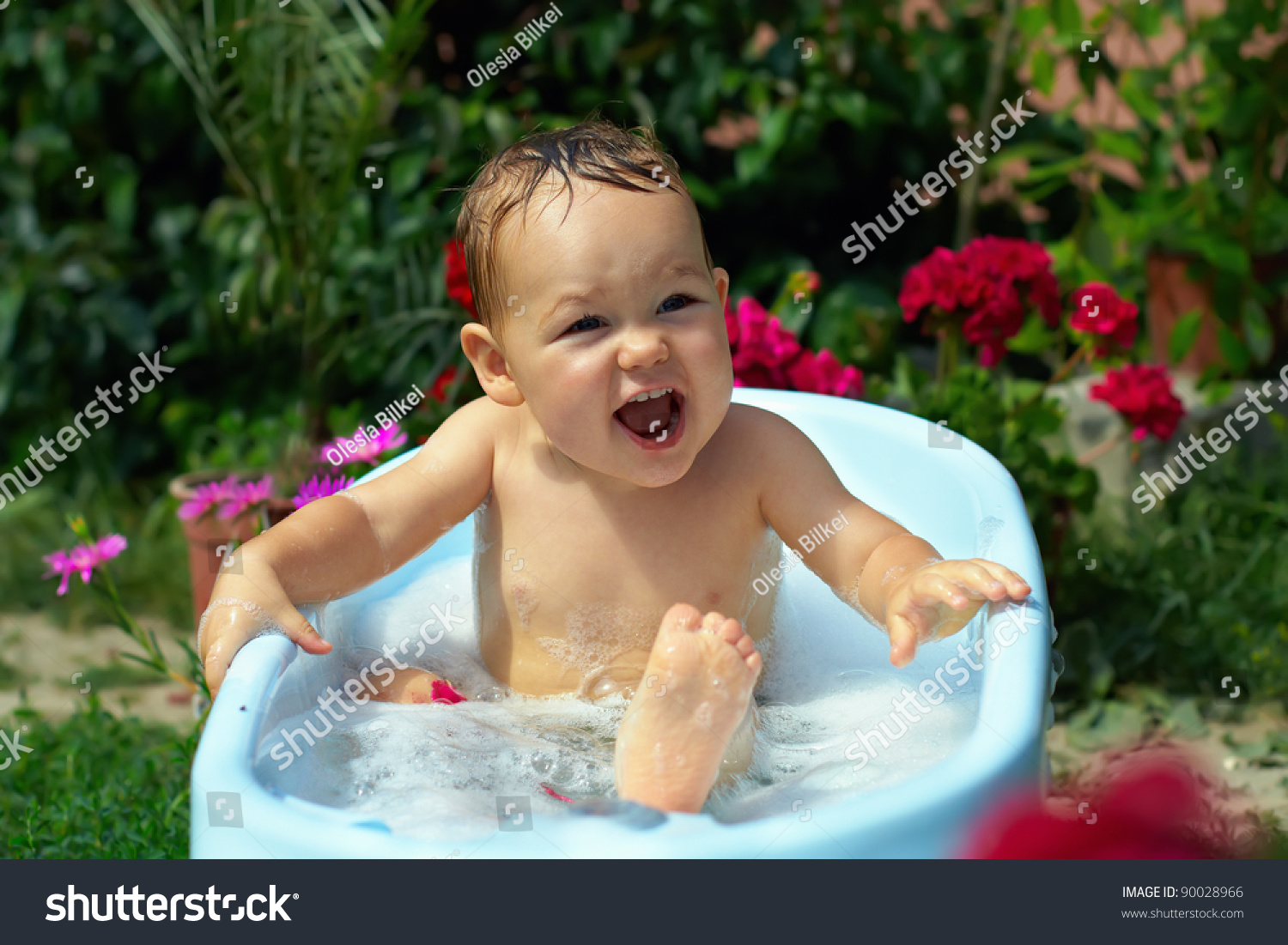 Cute Funny Little Boy Bathing With Bubbles Outdoor In Green Garden ...