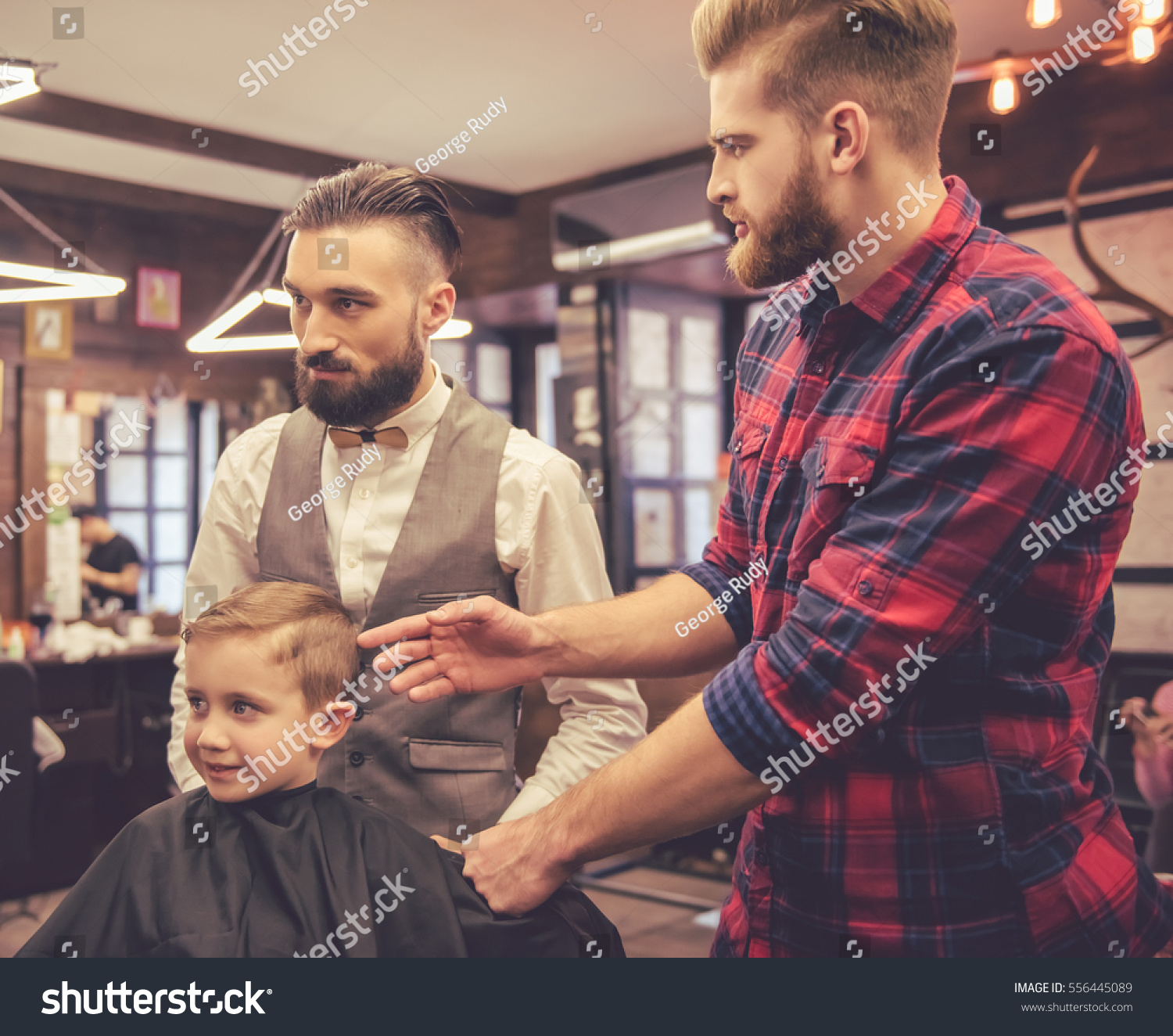 Father and son hair cut Images, Stock Photos & Vectors | Shutterstock