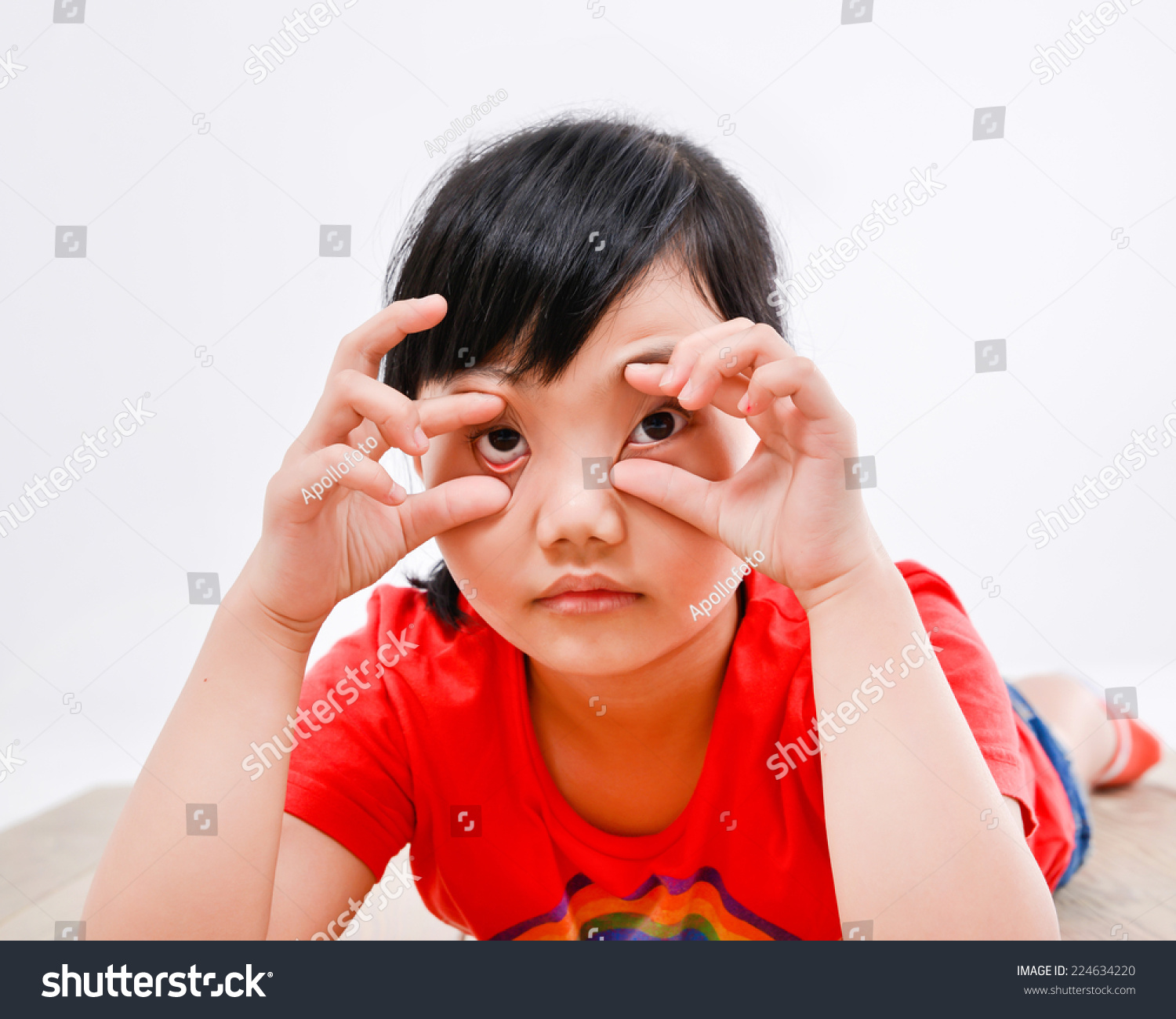 cute-little-girl-bed-hands-fun-stock-photo-224634220-shutterstock