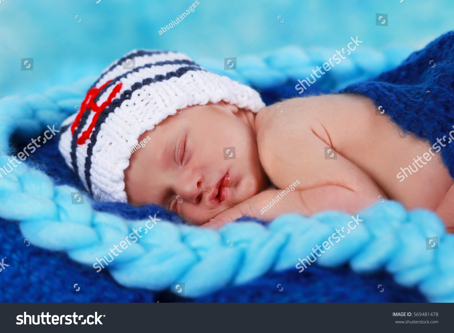 cute-new-born-baby-girl-sleeping-stock-photo-edit-now-569481478