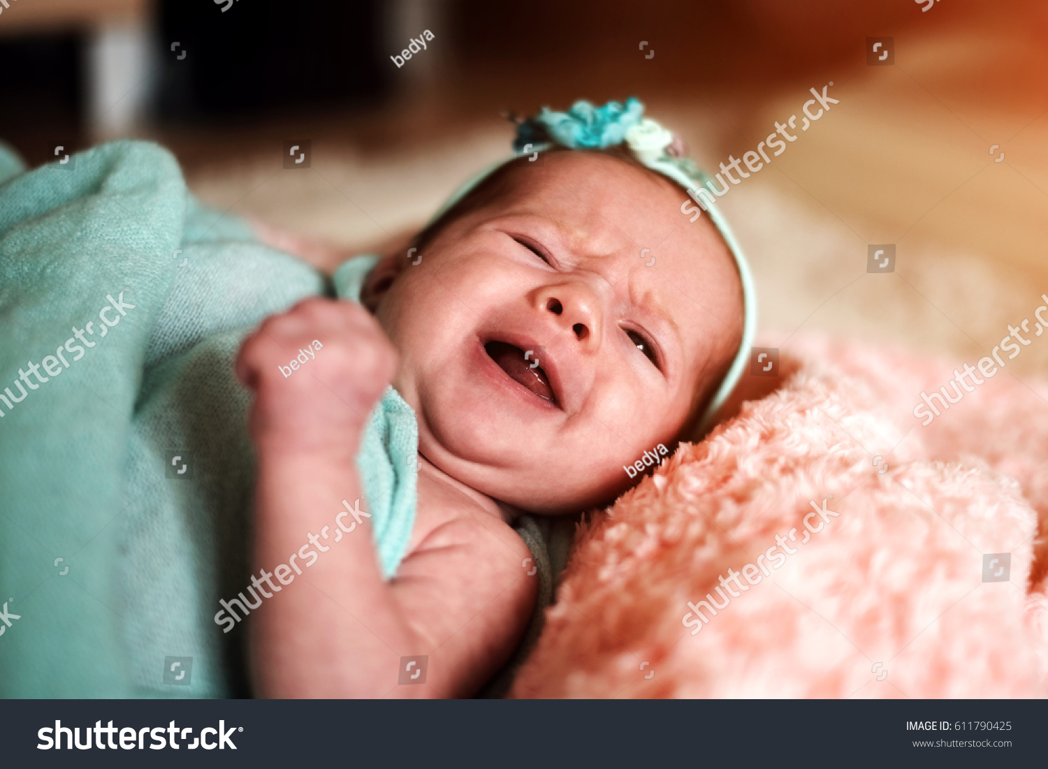 cute-newborn-baby-girl-bed-stock-photo-611790425-shutterstock