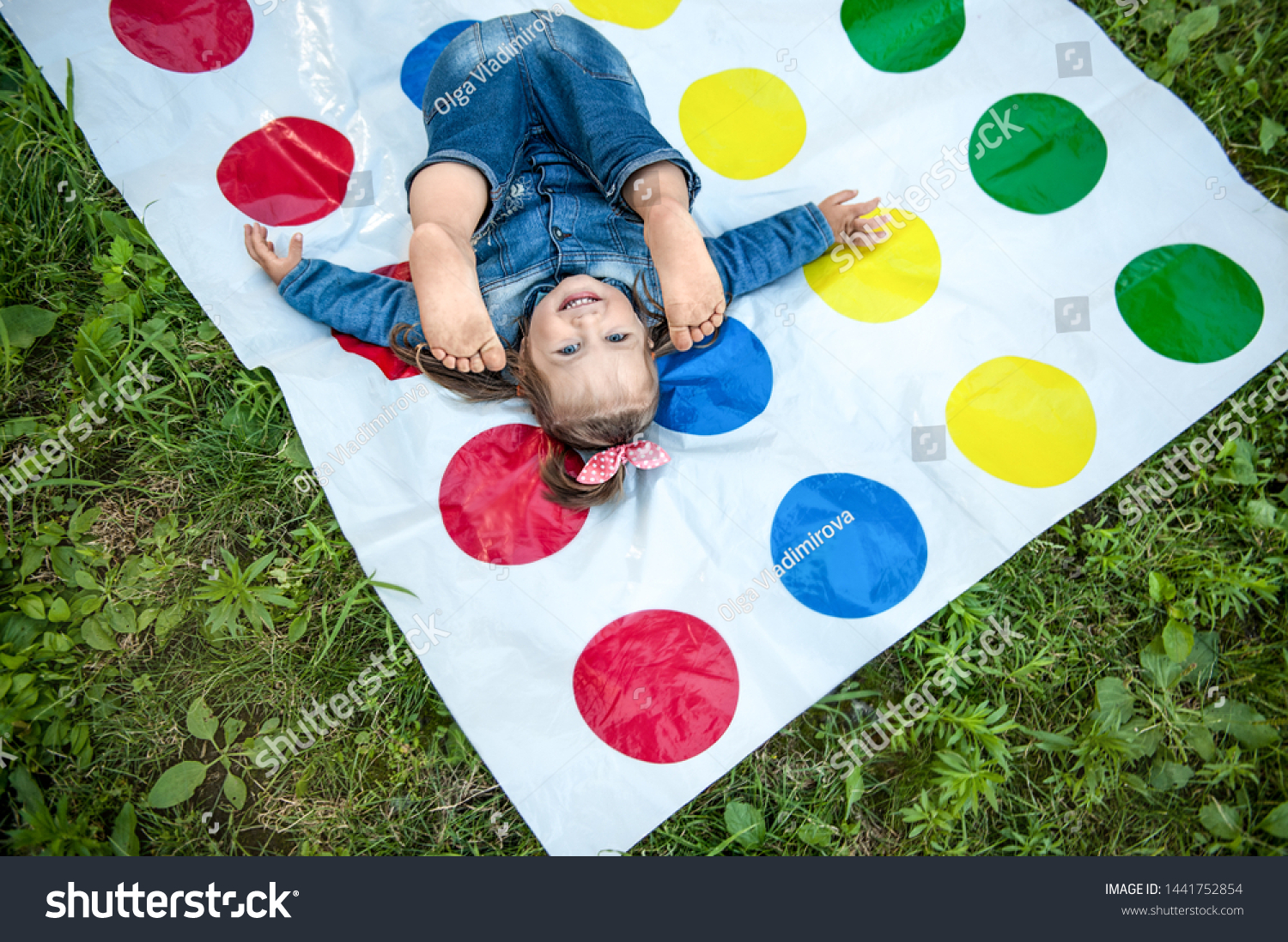 Cute Playful Toddler Girl Lying Down Stock Photo 1441752854 | Shutterstock