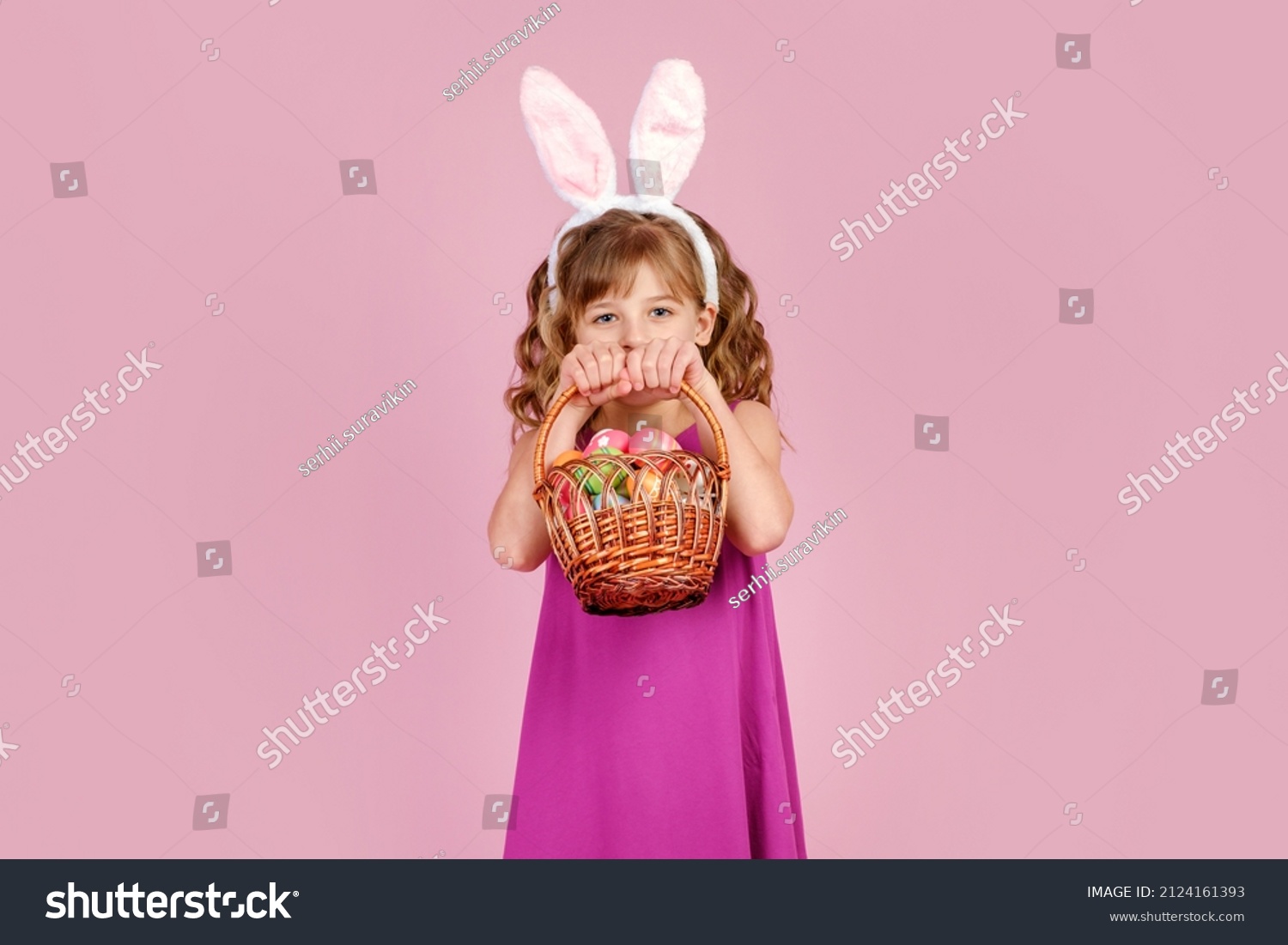 cute-positive-little-girl-curly-hair-stock-photo-2124161393-shutterstock