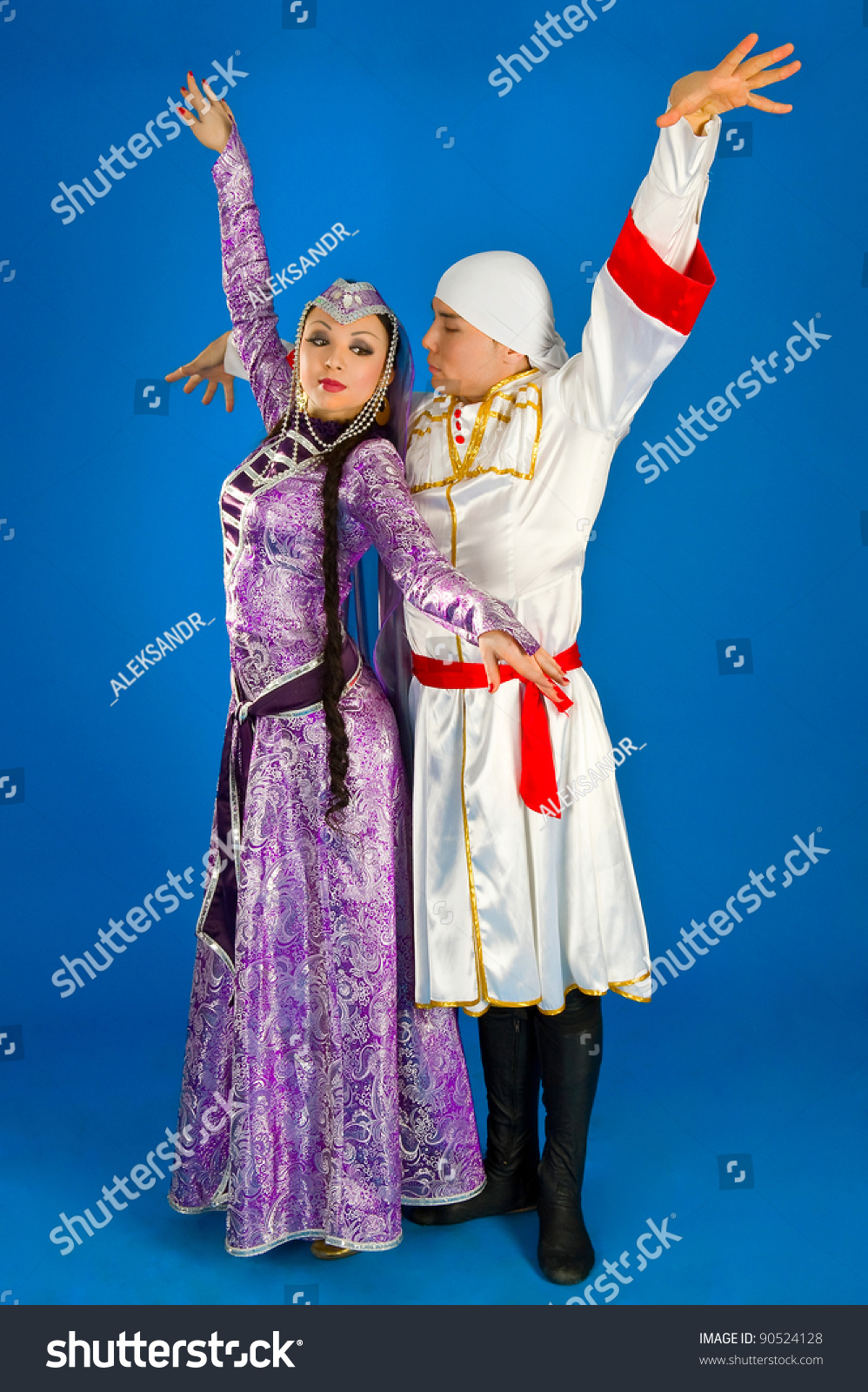 Dancing Boy And Girl In Traditional Costume Of Georgia On Blue ...